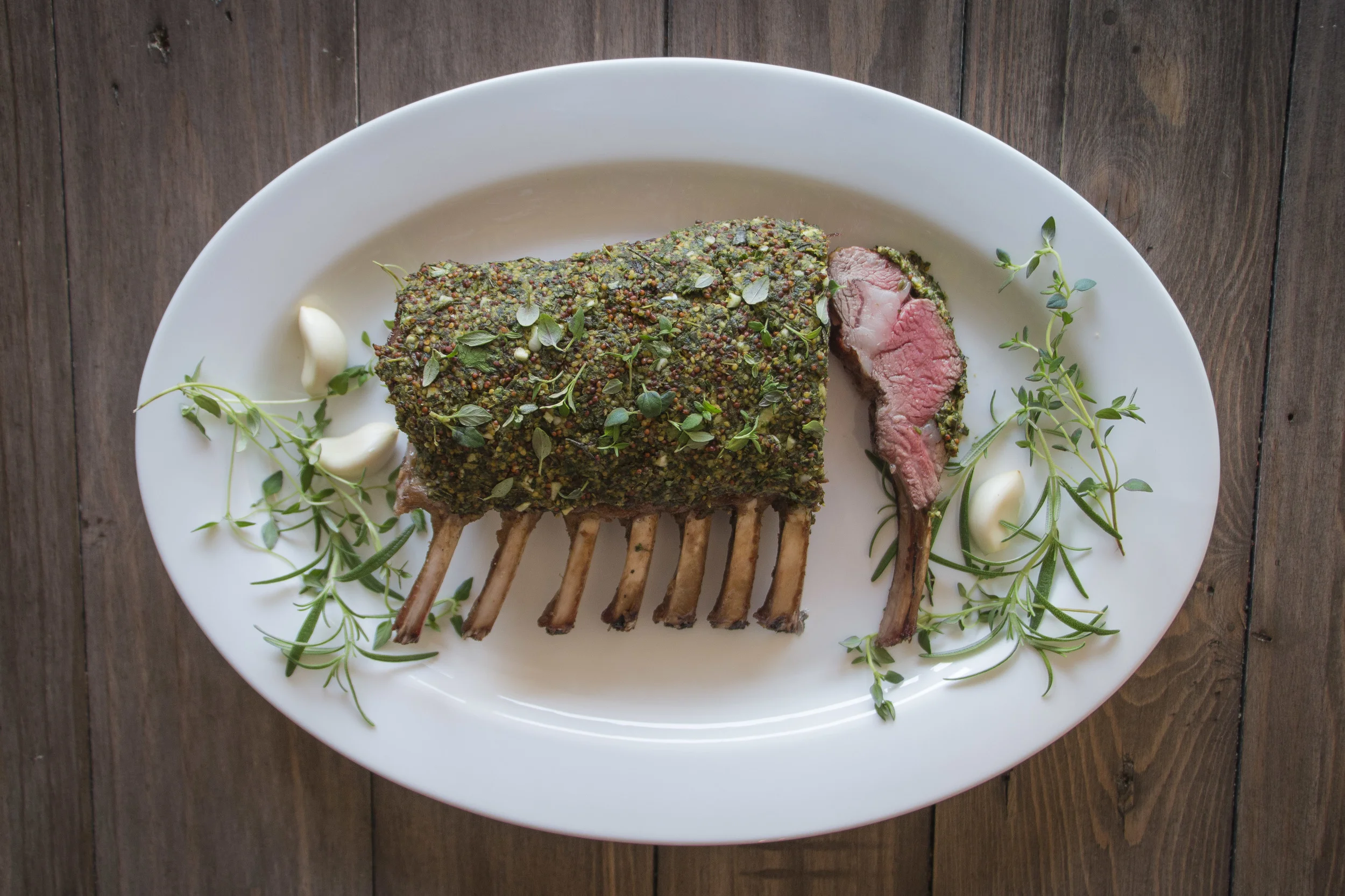 Herbed Rack of Lamb with Rosemary and Pomegranate Sauce