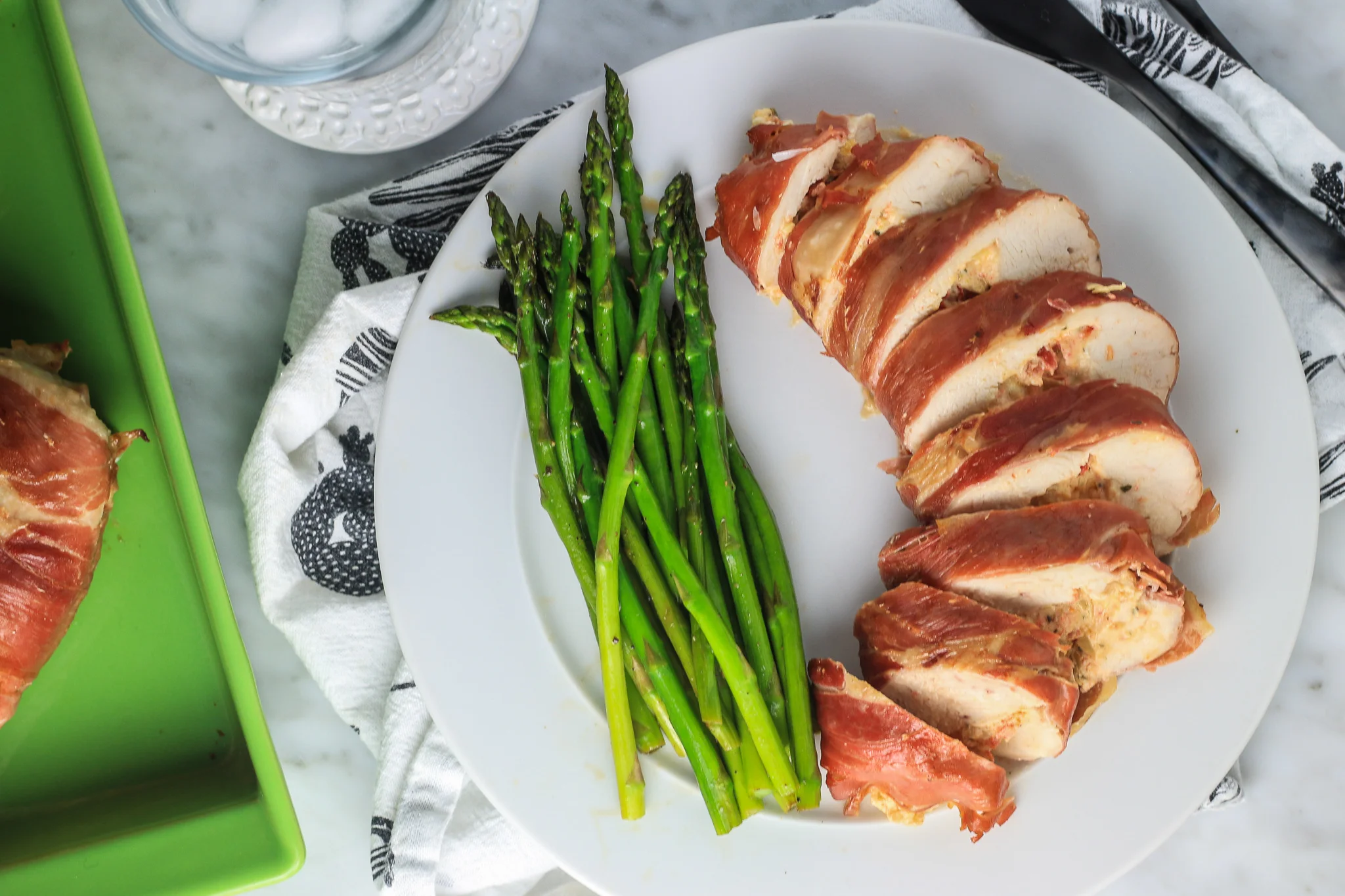 Prosciutto Wrapped Chicken Stuffed with Sun-Dried Tomatoes and Artichoke Hearts