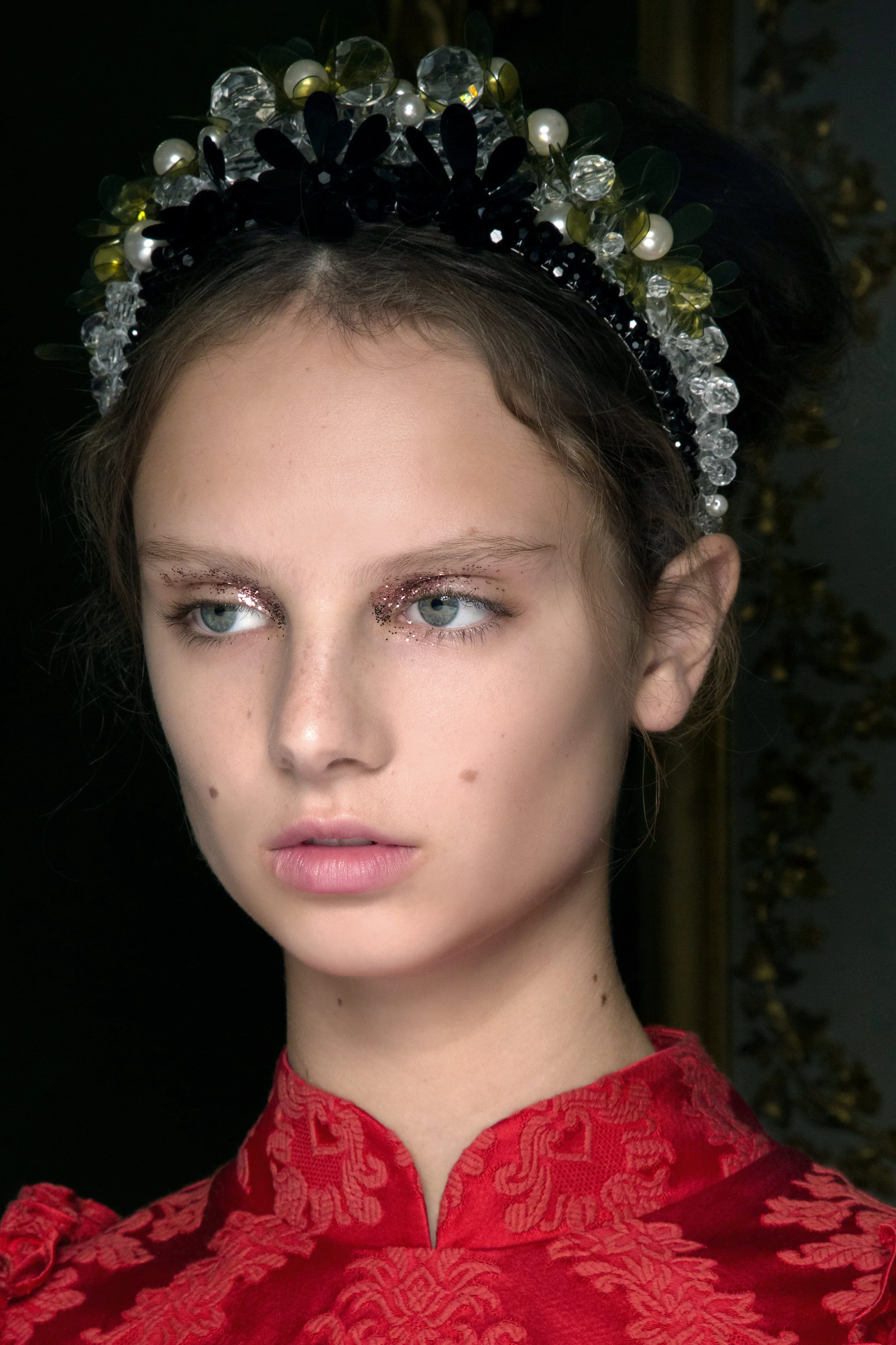 SIMONE ROCHA Fresh youthful skin topped with a dab of glitter on the eyes. Look created by Sam Bryant.