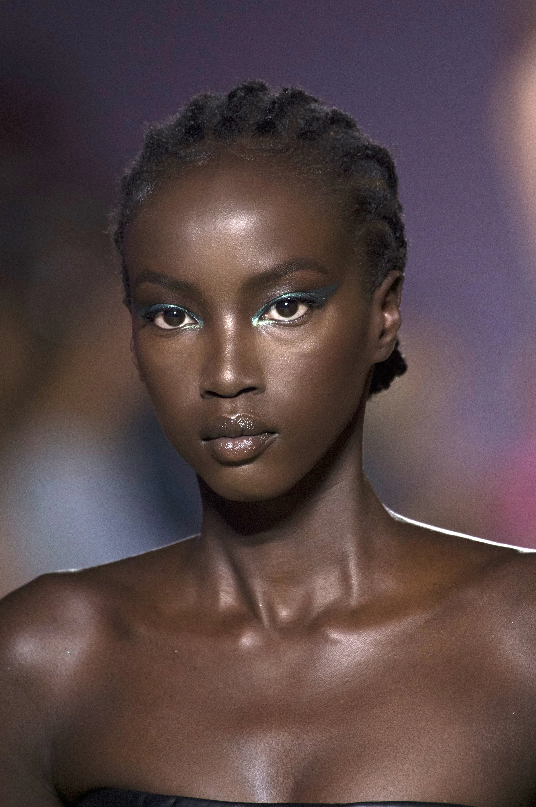 VERSACE Metallic bright eyeshadow extended all the way out to the temples. Look created by Pat McGrath.