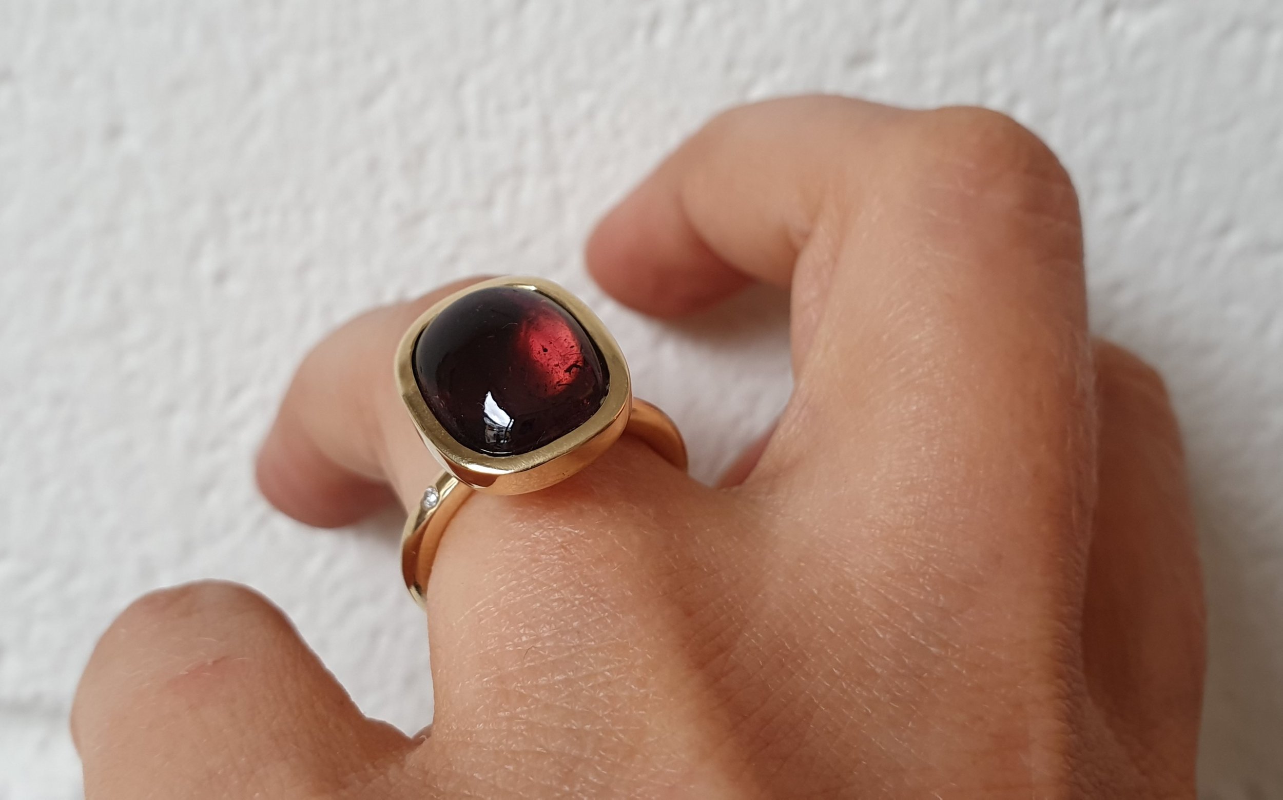 18k-yellow-gold-pink-tourmaline-cabochon-engagement-ring.jpeg