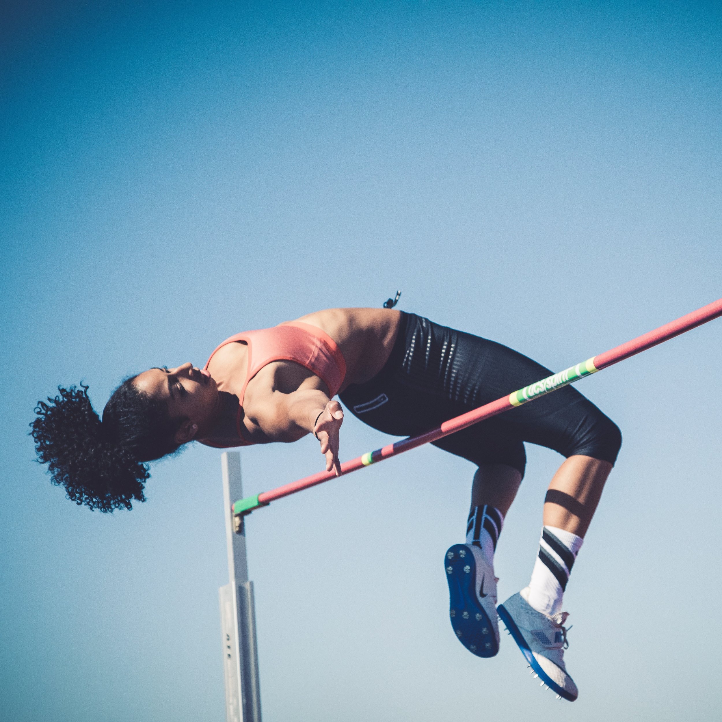 black woman high jump justyn-warner-551353-unsplash.jpg