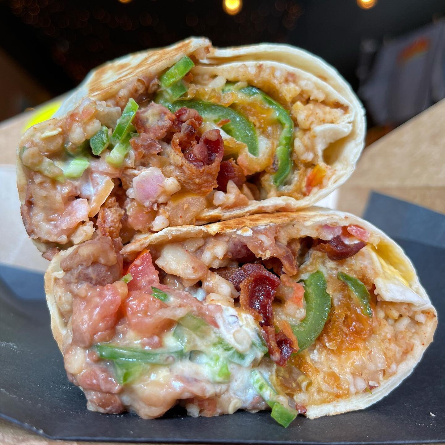 Spice up your week with this Feature Burrito! 🔥

🌯Jalape&ntilde;o Popper Burrito 🌯 
Cheese stuff beer batter fried jalape&ntilde;os, queso sauce, pico de gallo, bacon, sour cream, rice, and beans! 

Available now on UberEats as our &ldquo;Feature 