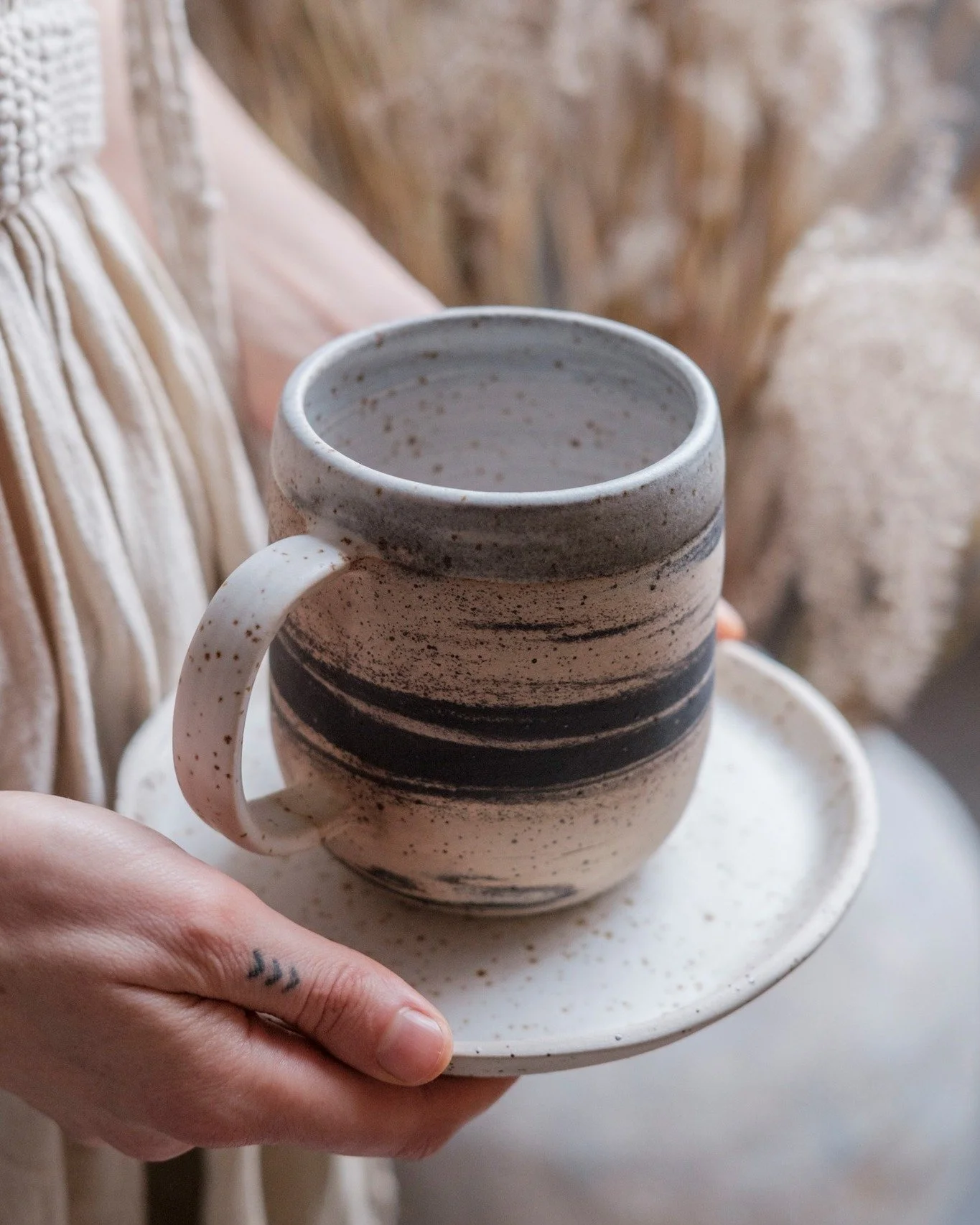 These mugs don&rsquo;t show up here often, but they&rsquo;re the ones we always keep in stock &mdash; my personal go-to every single morning for the last 10 years.

The marbled version is made from a mix of two different stoneware bodies, blended dir