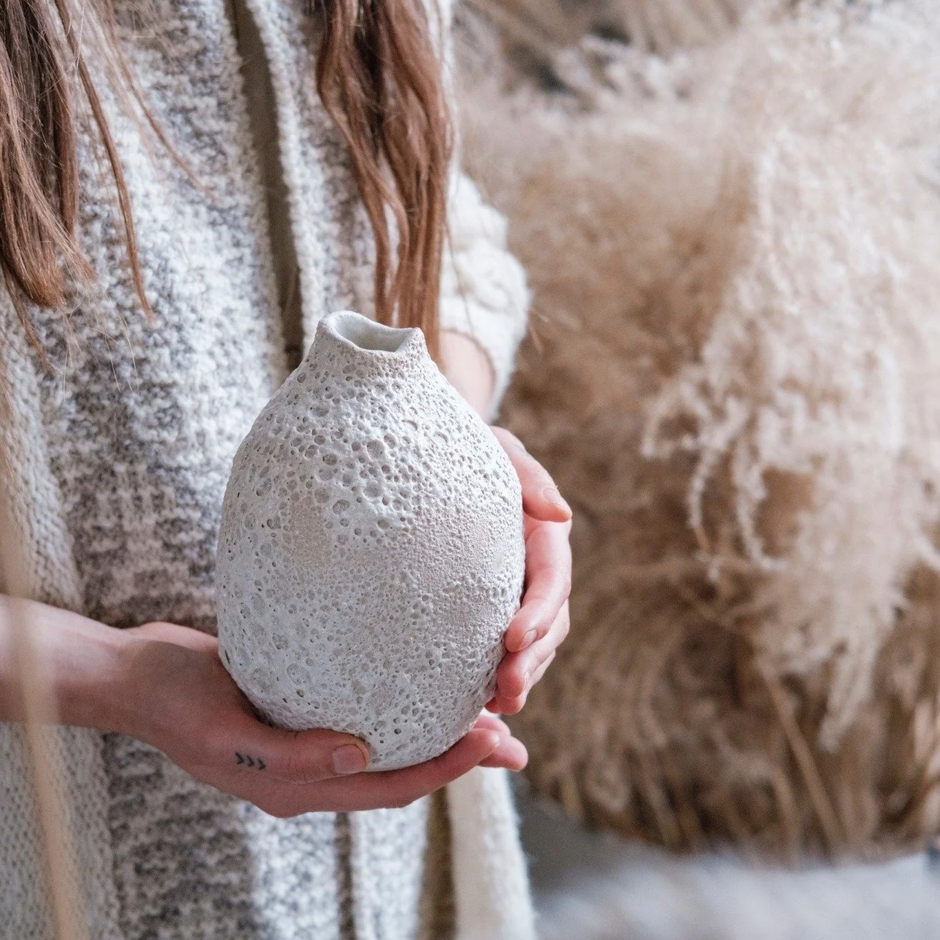 Small, bigger, a little bigger still&hellip; and a giant Moon 😄
Moon bud vases in all the sizes.

Watching them lined up like this always makes me smile &mdash; same language, same glaze story, just growing in confidence. 

Naturally, the next thoug