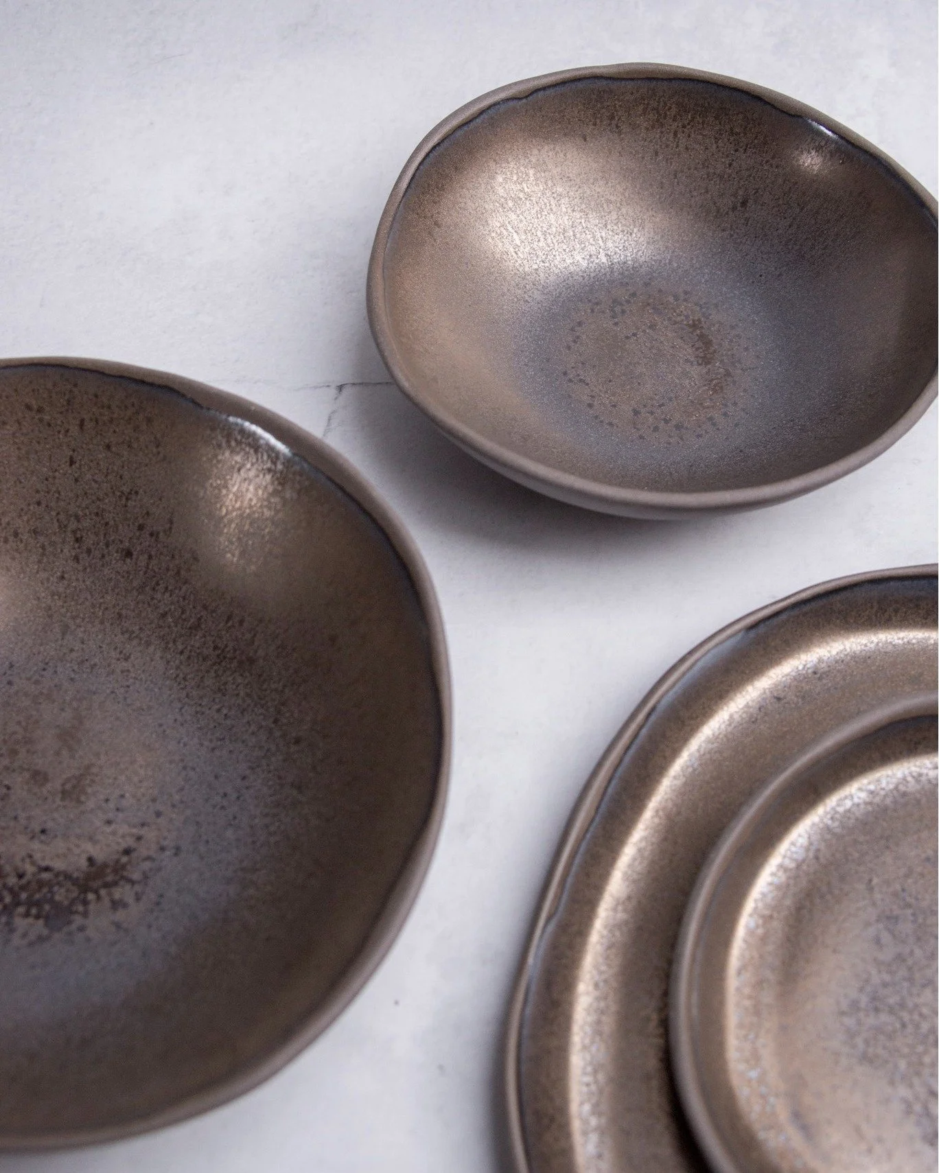 Dinner set in bronze glaze.

 #handmadeceramics  #ceramics  #pottery