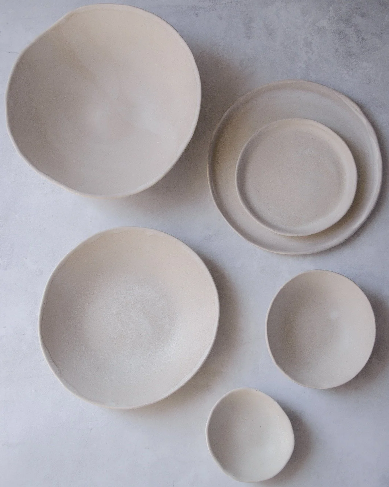 Our 2025 wholesale bestseller dinnerware set was SAHARA &mdash; a simple, timeless collection finished in a soft beige matte glaze on porcelain.

No dramatic textures or complex effects. Just quiet proportions, warm neutrality, and surface designed t