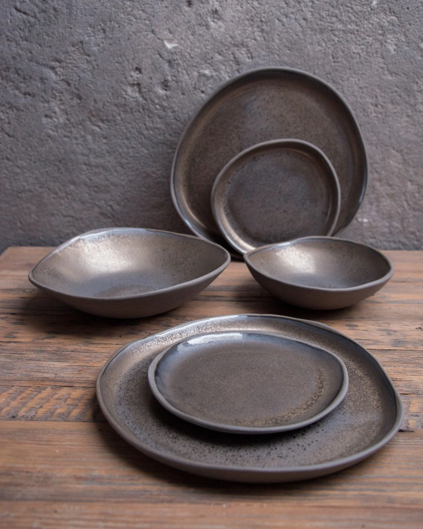 Stoneware dinnerset in bronze.

 #handmadeceramics #ceramics #tableware