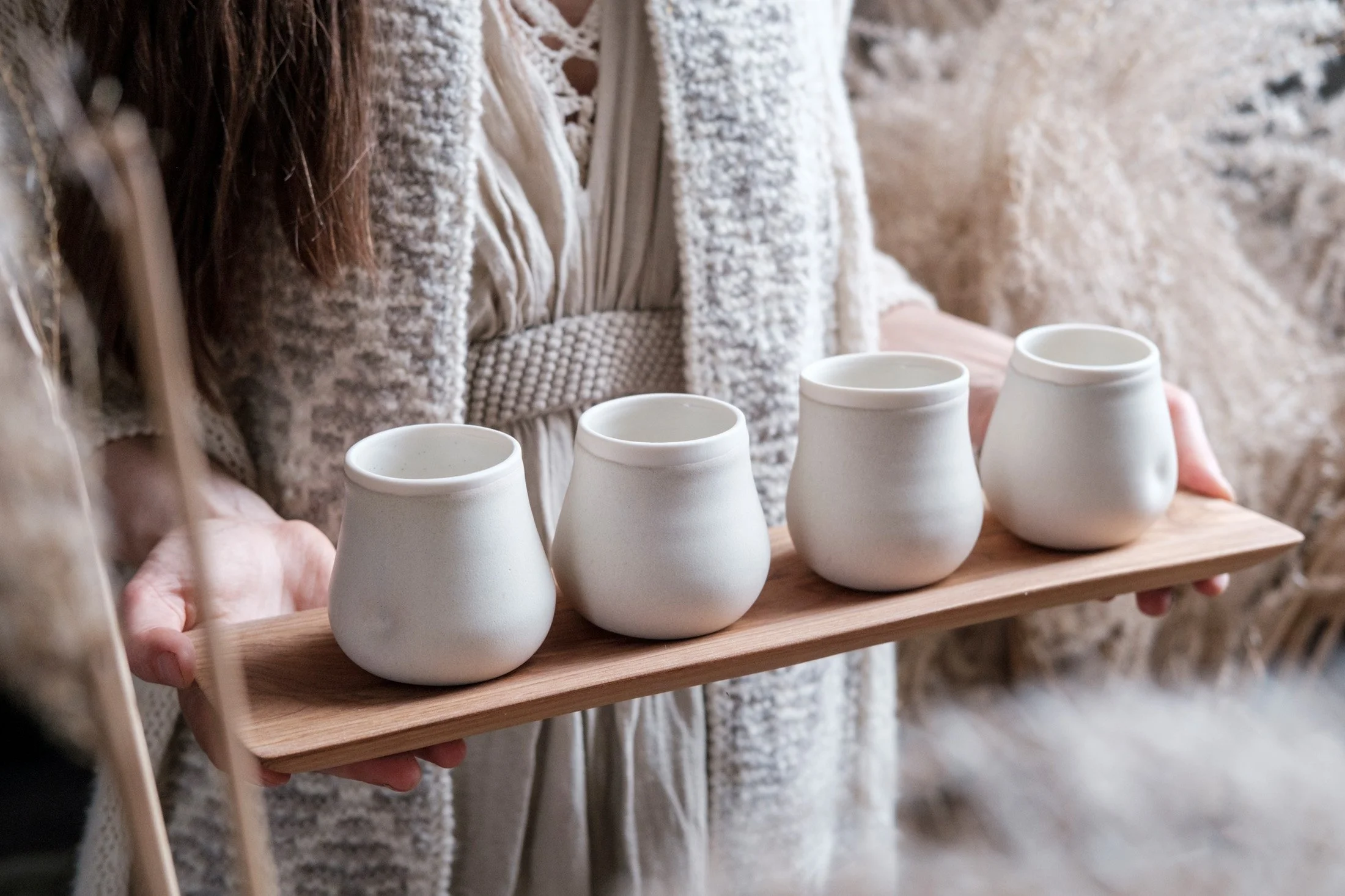 Wheel-thrown cups and wood platter