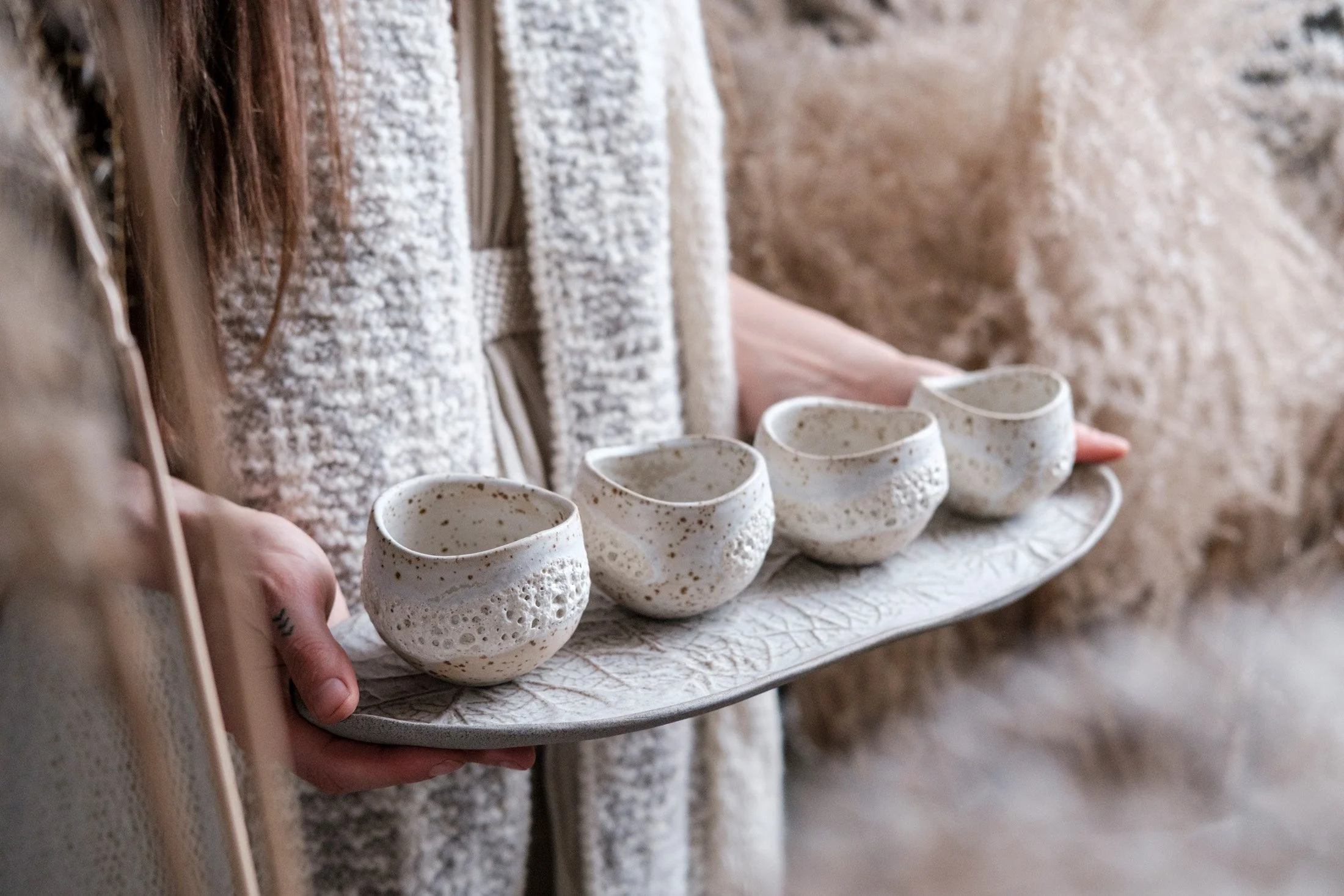 Wheel thrown cups with lava glaze inlay