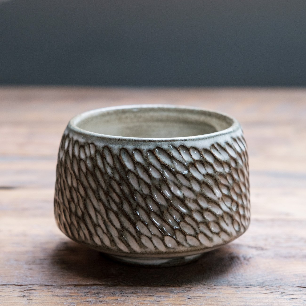 IVORY GLOSSY on grey SW – Laima Ceramics.jpg