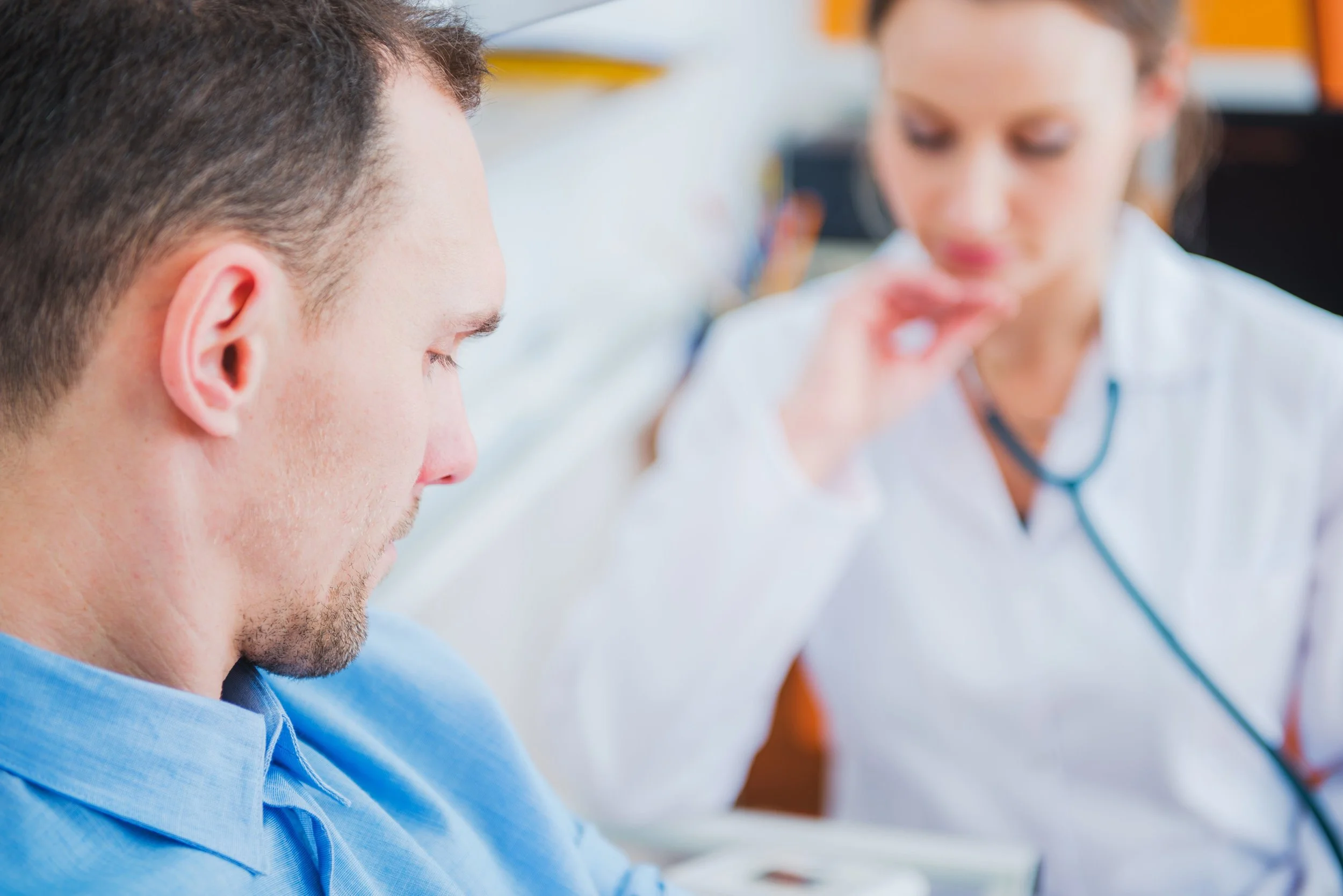men-visiting-doctor-office-PZWTJHQ.jpg