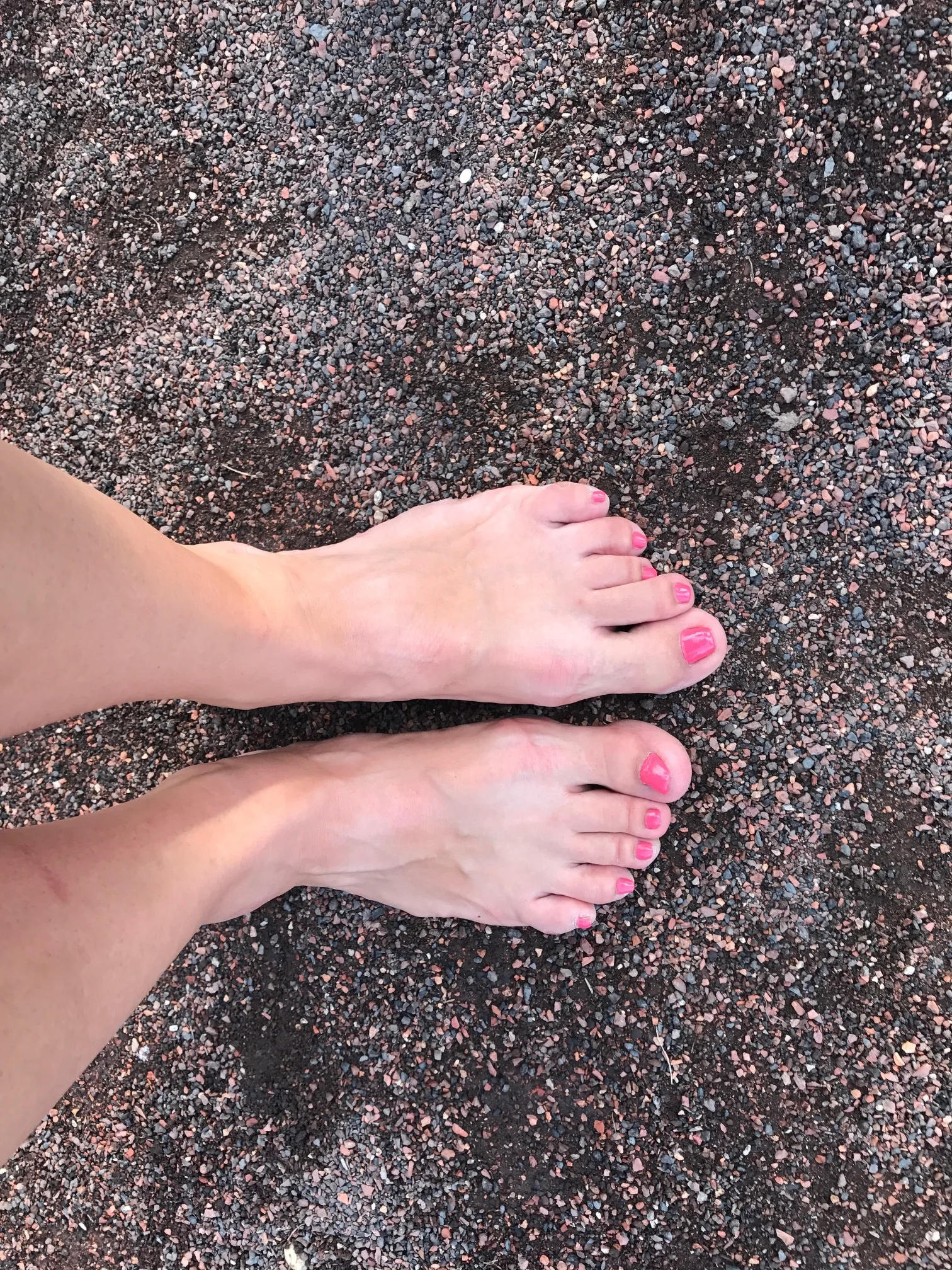 My bare feet in the dirt on the third base line at Wrigley Field, June 2017.
