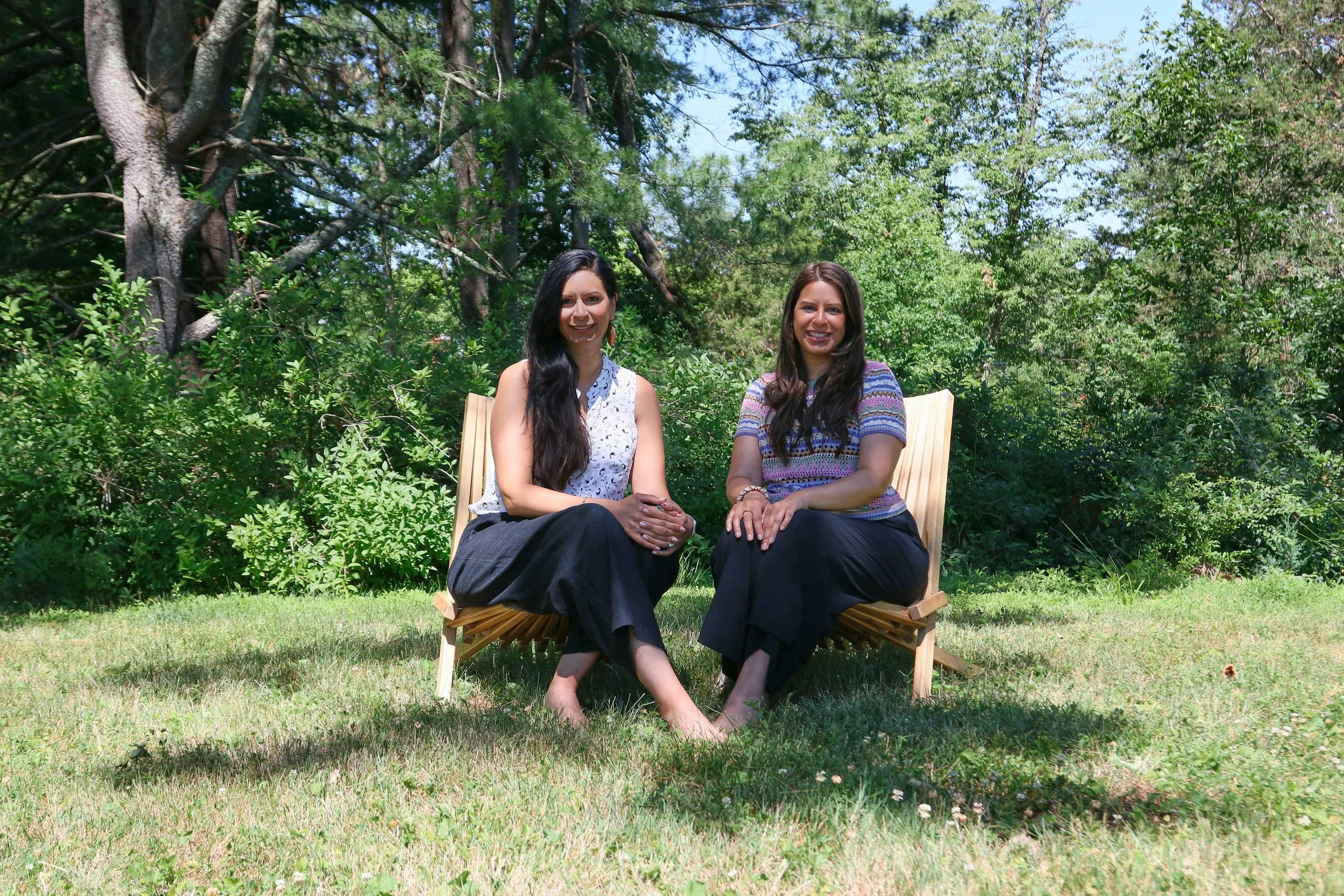 Asha and Pratima Surti sitting together outside after a reiki and sound bath session in Princeton, NJ