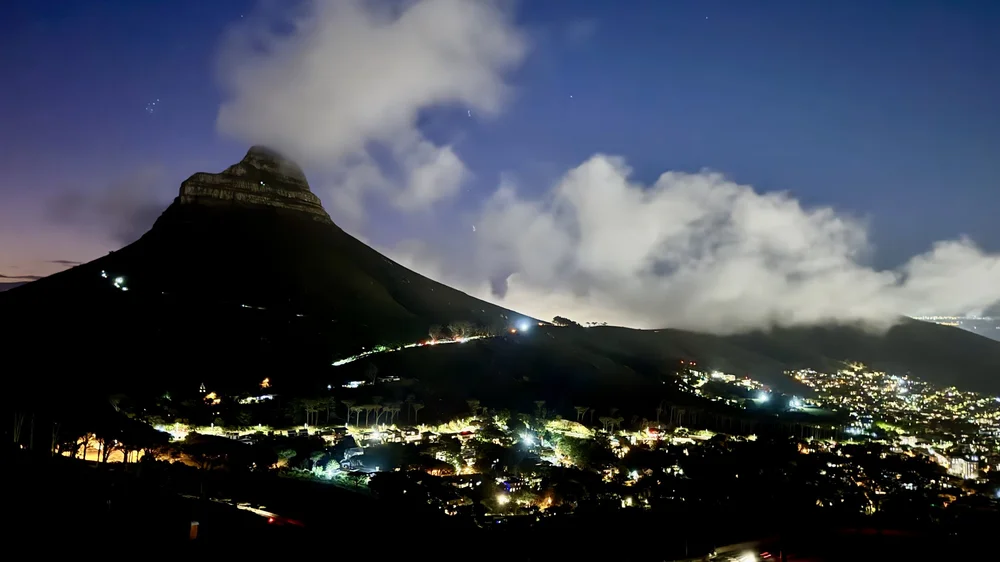 VIew of Lion's Head from Table Mountain at night