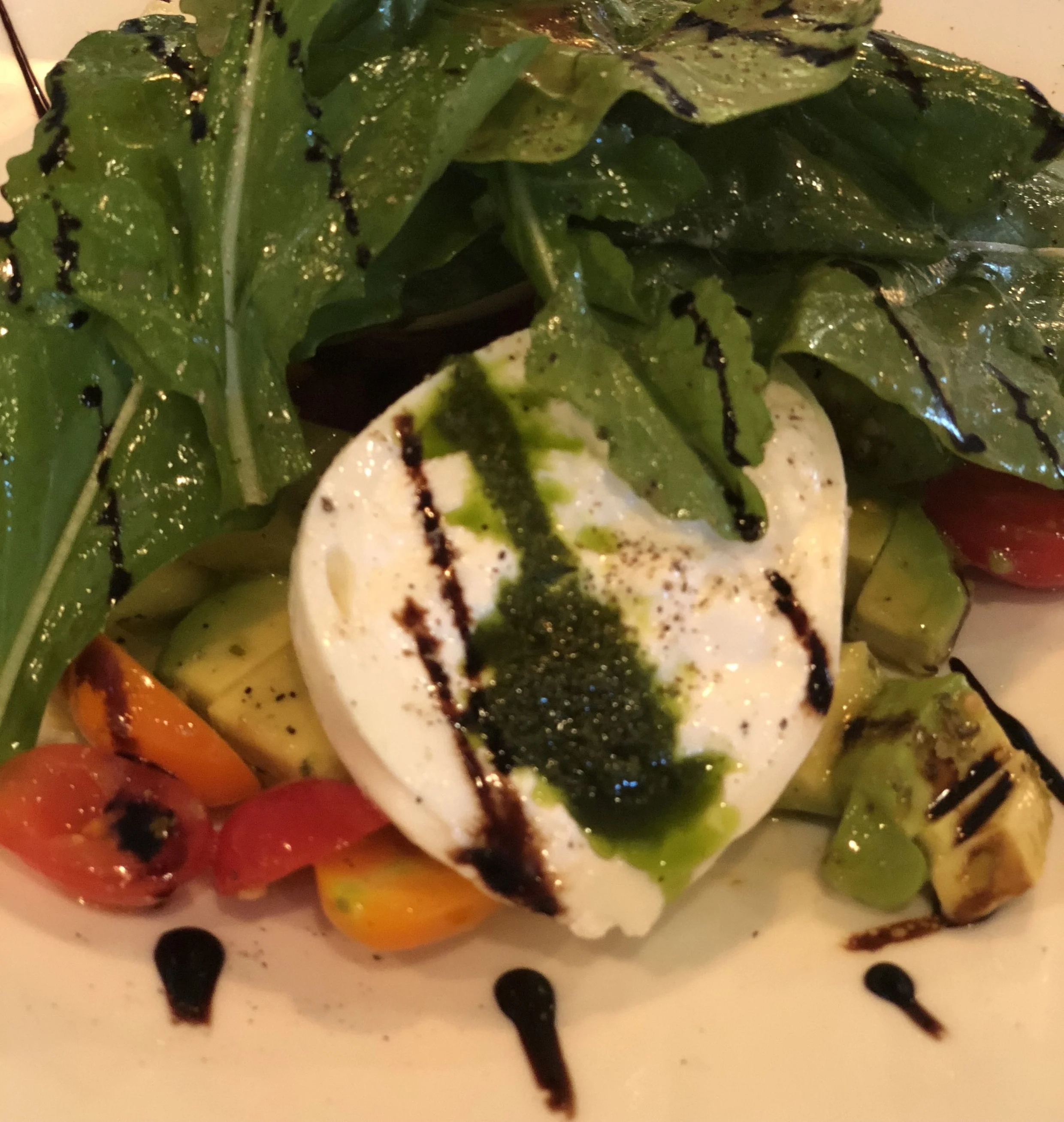 The aged balsamic compliments the creaminess of the fresh burrata.