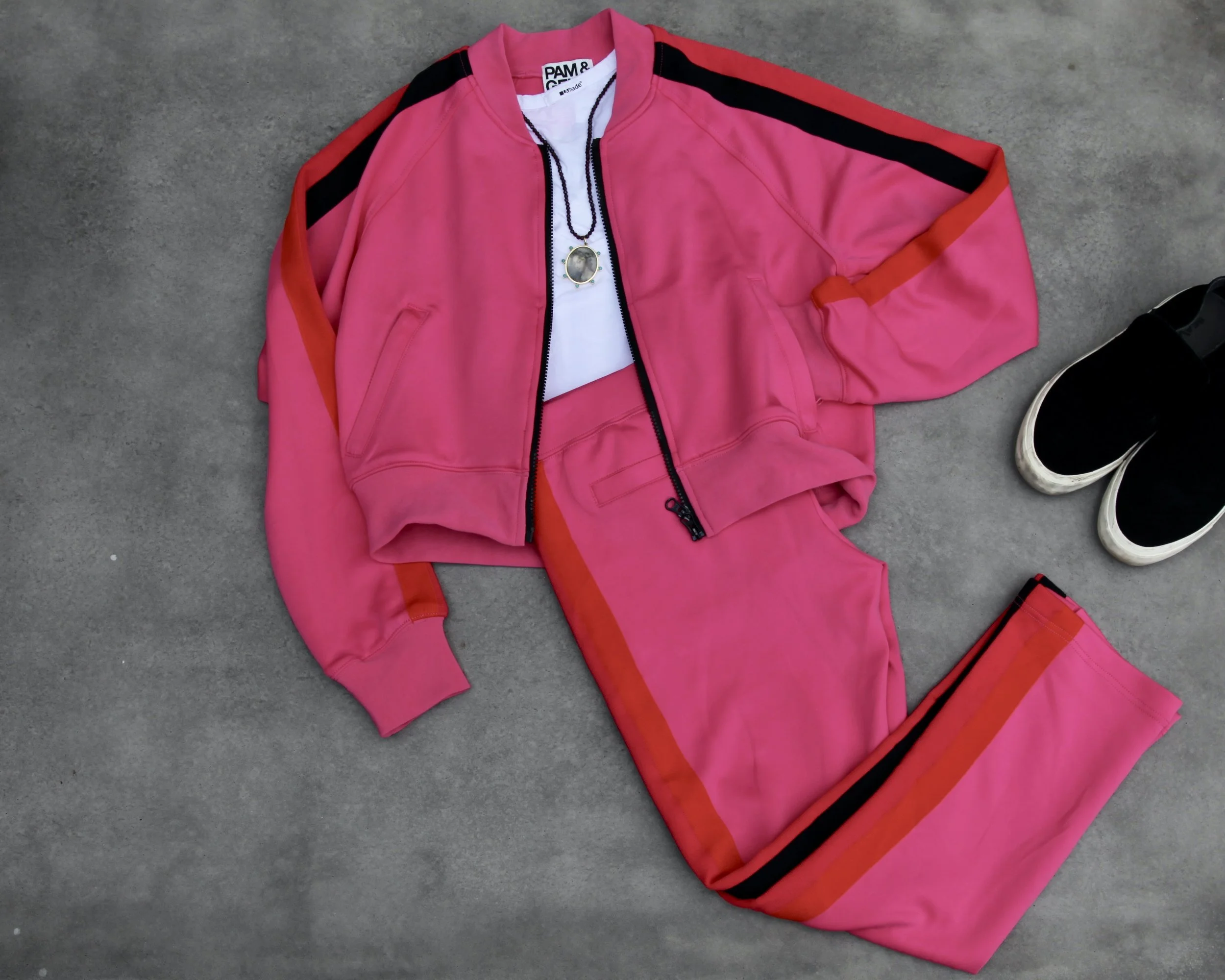 Pam and Gela (of Juicy Couture fame) track set . Match it with black tennies and a white racerback tank .