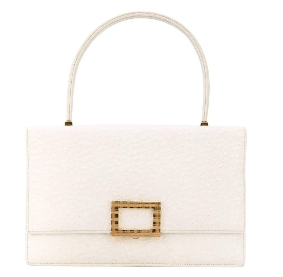 White Beluga whale leather is the perfect touch to add structure and interest to this 1960’s Hermes bag offered on 1st Dibs.
