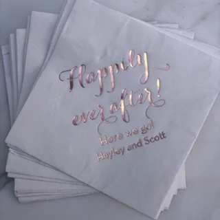 A little note adds a nice little touch to a cocktail napkin.