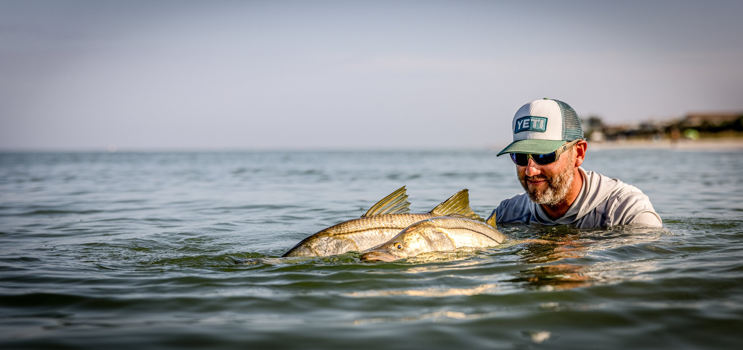 Capt. Phil with 2 Snook -Clearwater Beach Fishing