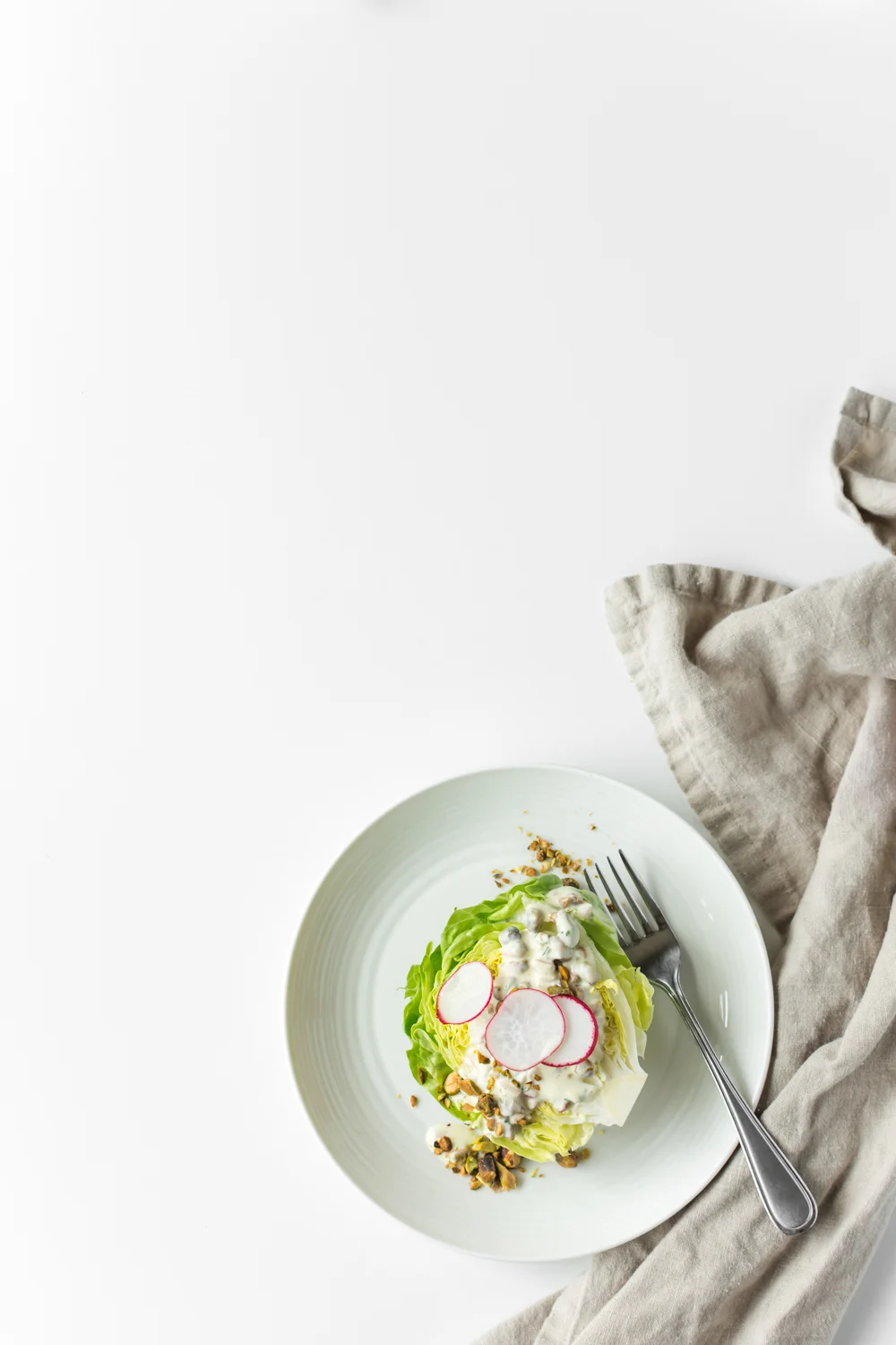 butter lettuce and creamy pistachio wedge salad