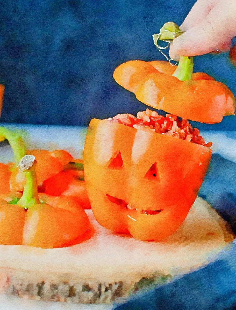 Jack O'Lantern Stuffed Peppers