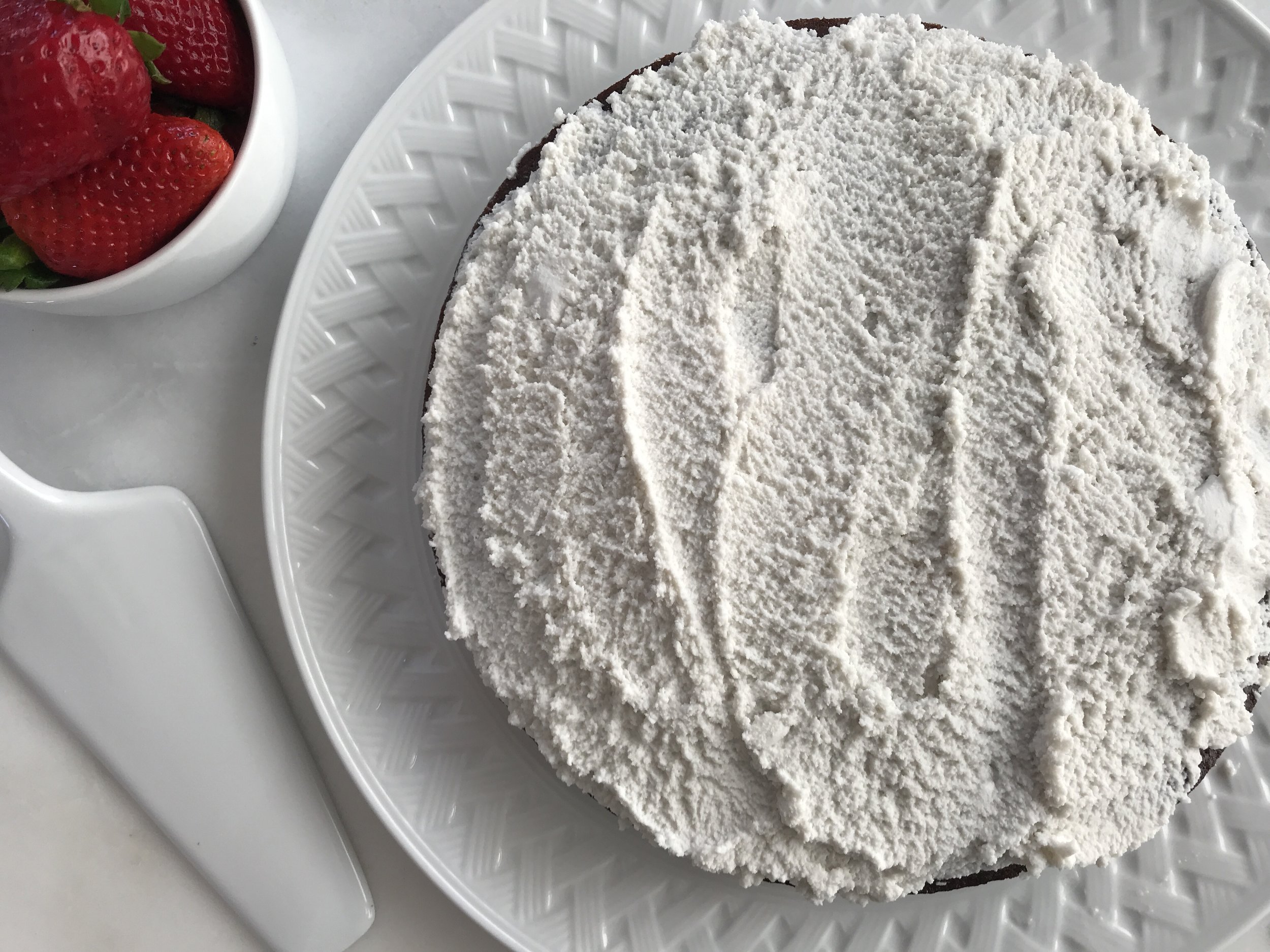 Cake with icing and stawberries.jpg
