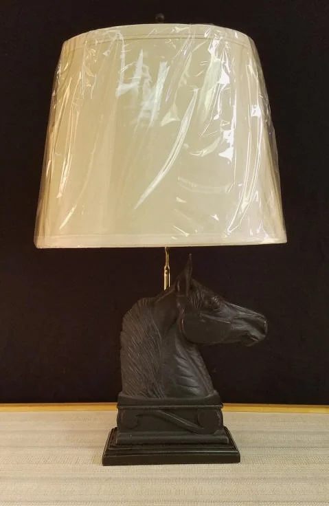 Cast Iron Horse Lamp This beautiful lamp has been made from a Cast Iron Bookend that was made by Virginia Metal Crafters, Copyright 1954 It stands 20" tall including the Oval Lampshade that is included. $250.00 plus shipping