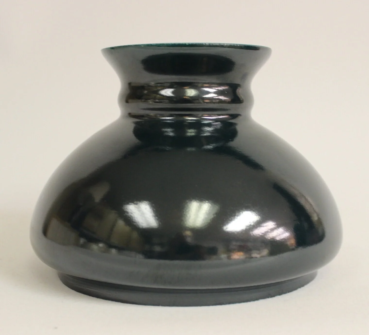 #DL7-003 - DARK GREEN - UNDERSIZED FITTER - SPECIAL PURCHASE - $50.00 7” fitter shades normally have an actual fitter measurement between 6-3/4” & 6-7/8” This shade has an actual fitter measurement of 6-5/8”. Works perfectly on an under-sized 7” ring. It does not “fill” a standard 7” Ring.