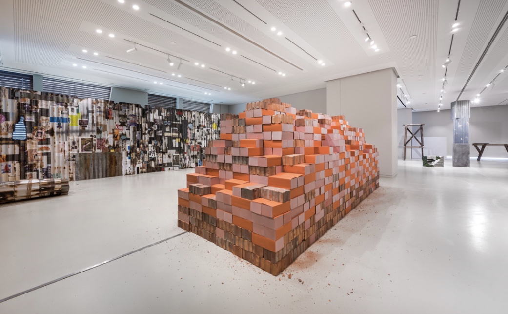 Irfan Hendrian, ‘Tropical Ephemerality: Brick Wall’, books and bricks, variable dimensions, 2019. Image courtesy of Hermès.
