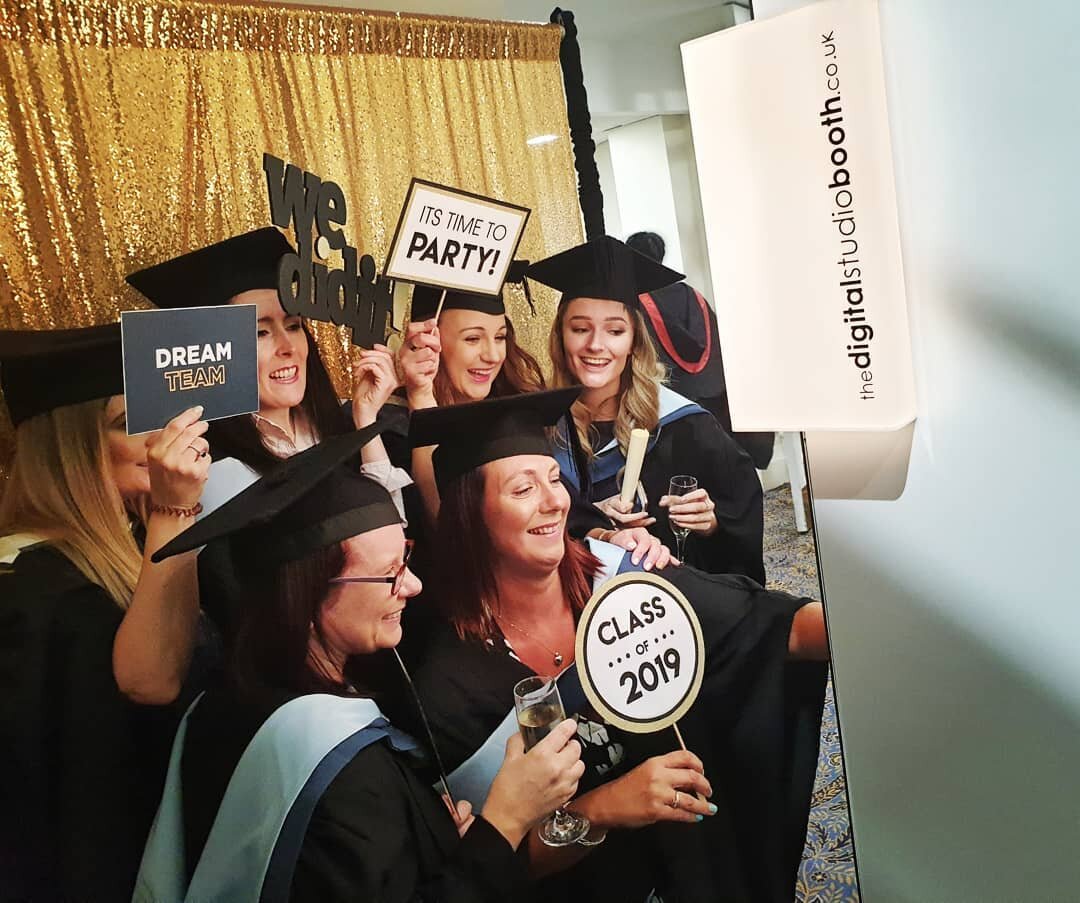 Graduating in style! 
Everyone's making the most of being dressed in all their finery and happily snapping picture with our booth.