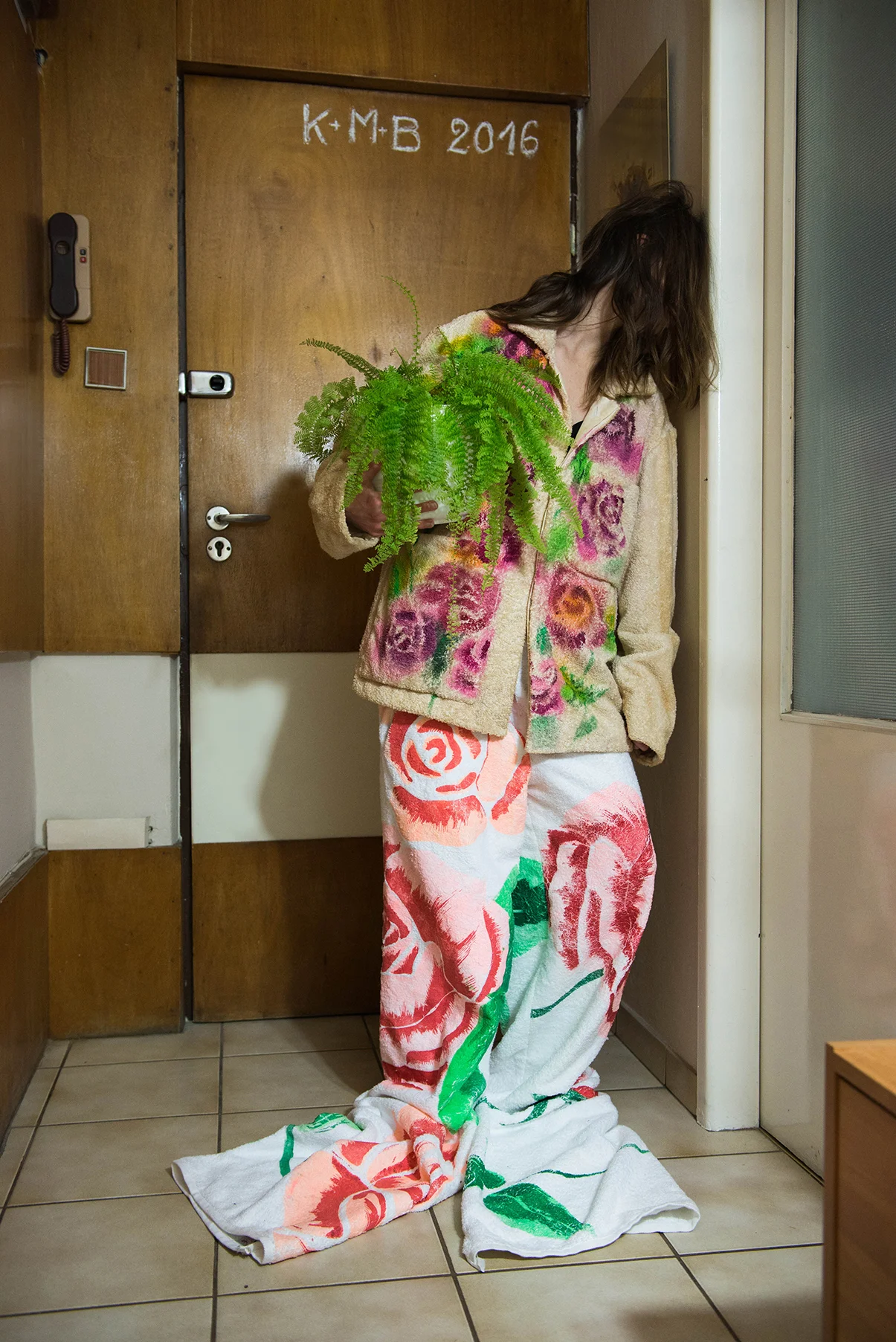 Iza is wearing shirt and pants by Michal Wisniewski