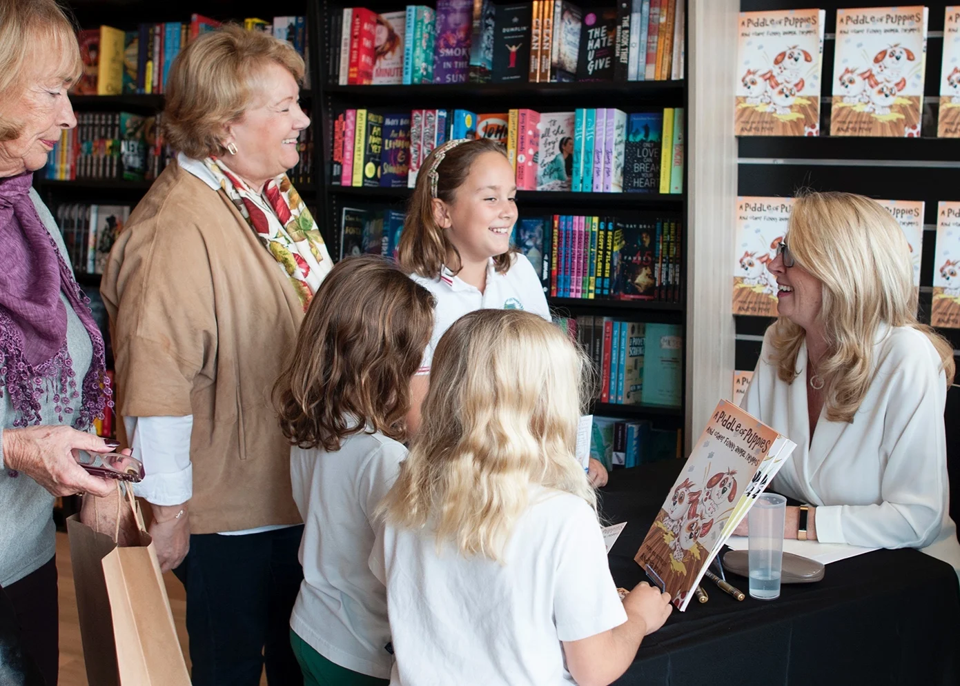 Excited children waiting for their signed copies :)