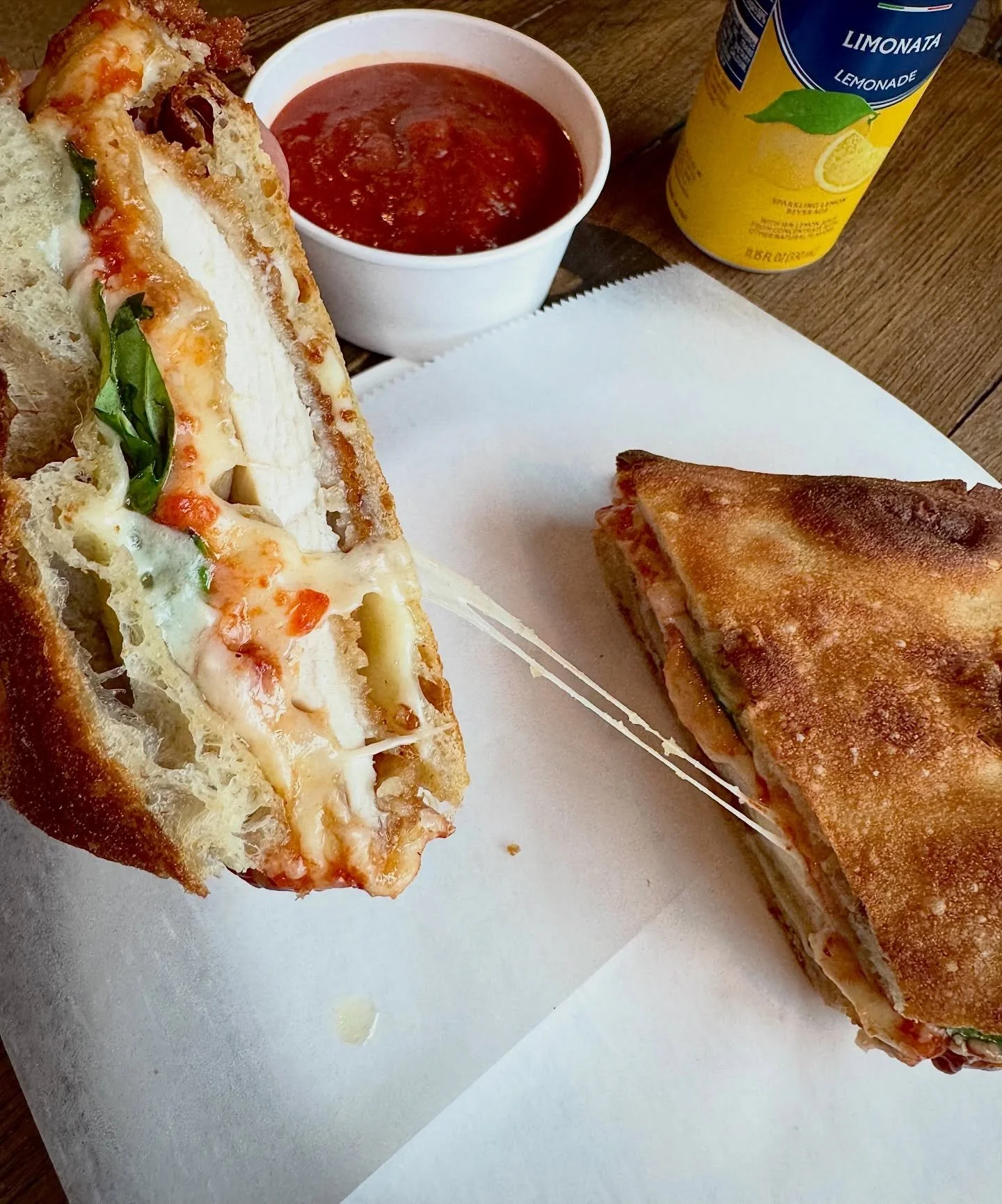 HAPPY THURSDAY EVERYONE
What a perfectly gloomy day to enjoy the warm, comforting goodness of our CHICKEN PARM SANDWICH!  Made with fresh chicken cutlets that we cook from scratch, Nana Q&rsquo;s tomato sauce, provolone, Grana, and basil on our baker