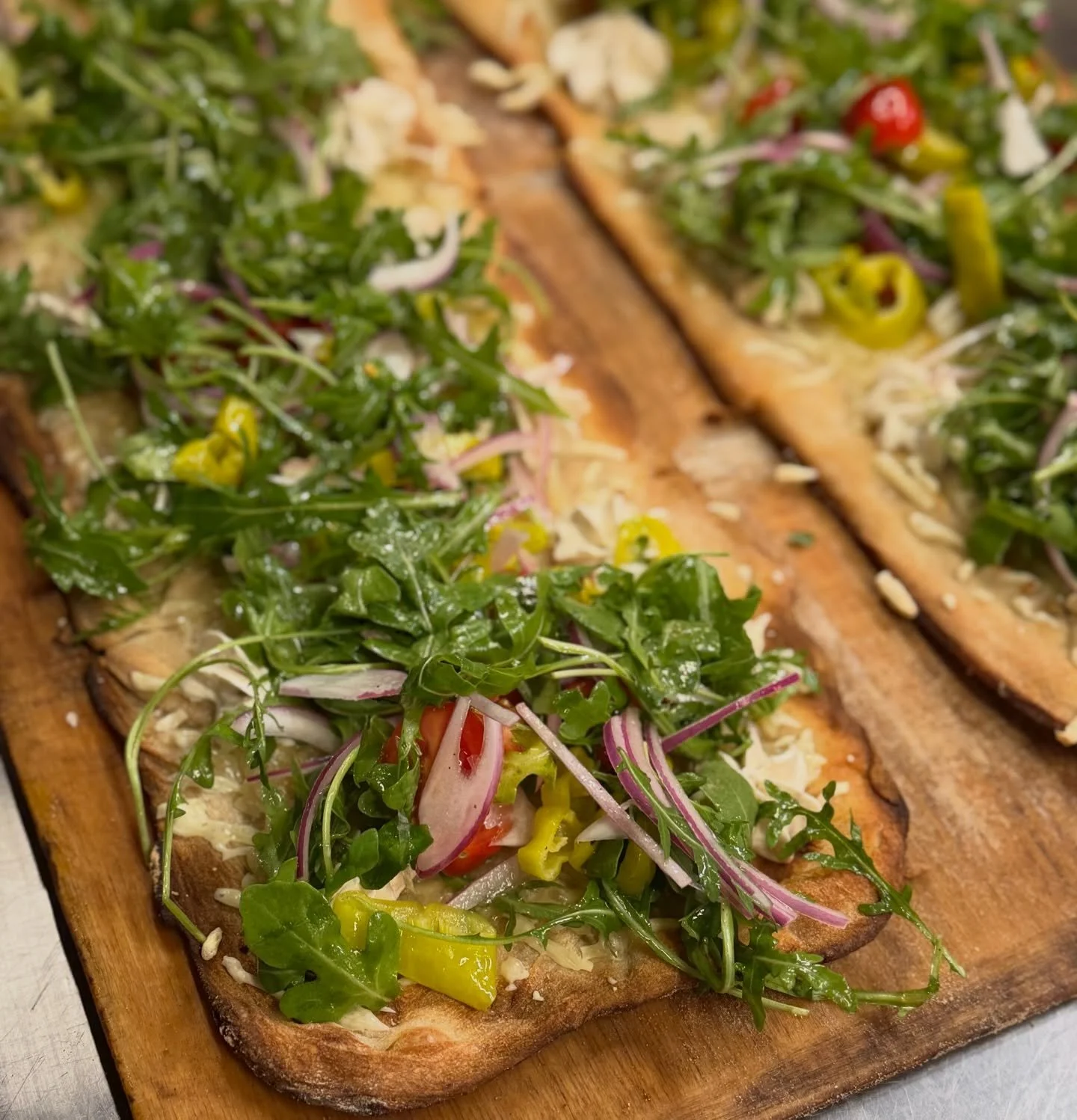 ENJOY A SLICE ON OUR PATIO
Spring is finally here and our patio is open! 
Perhaps you&rsquo;ll choose something from our Pronto Slice Bar, such as one of our vegan slices shown here awaiting their final touches.  We hope you&rsquo;ll stop by today - 