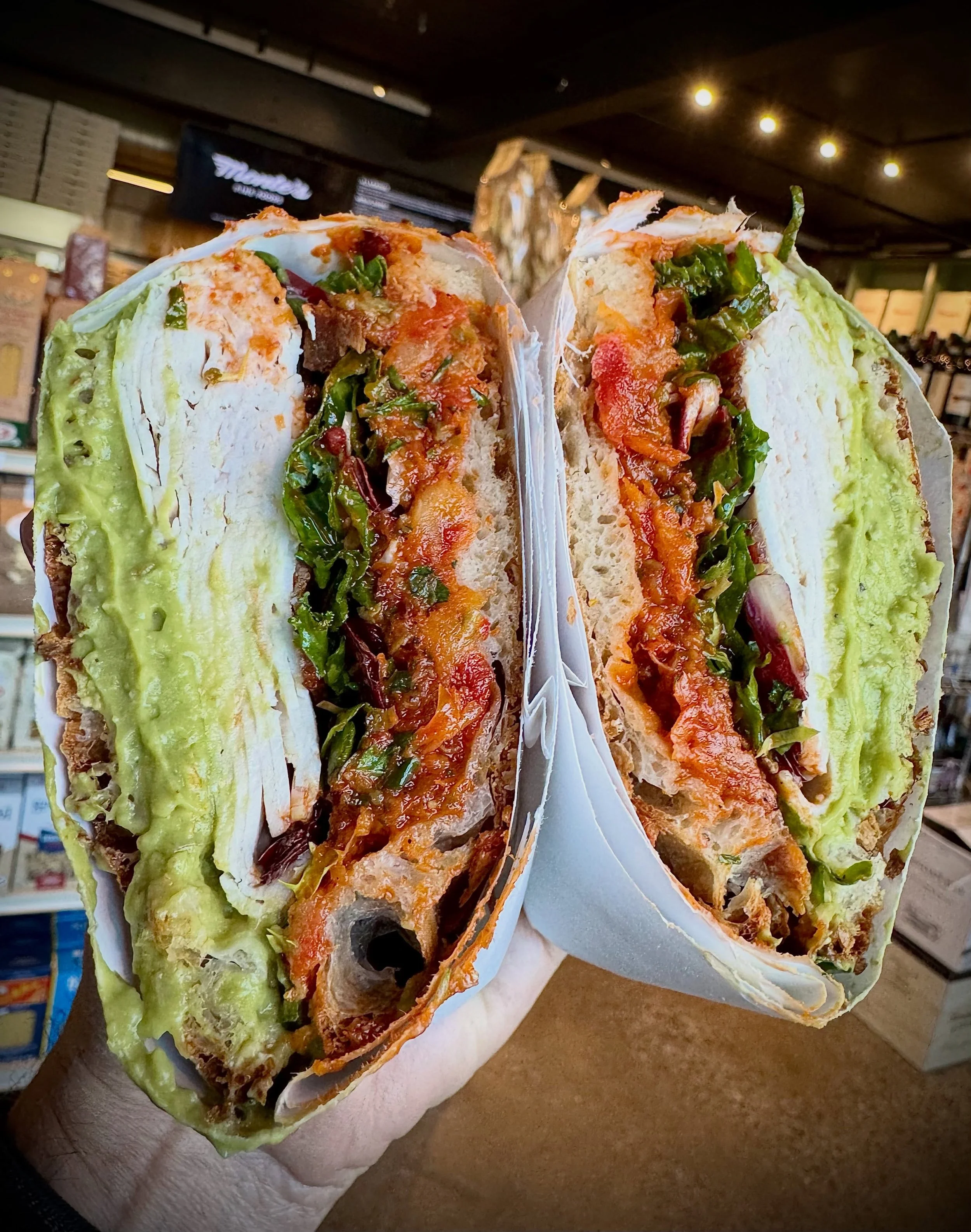 HOUSE-ROASTED TURKEY
mashed avocado, @northcountrysmokehouse bacon, dark greens, and salsa rossa (sun-dried tomato, Castelvetrano olives, lemon zest, garlic, mint, basil) on pizza bianca flatbread &mdash; it&rsquo;s Monte&rsquo;s TURKEY CLUB SANDWICH