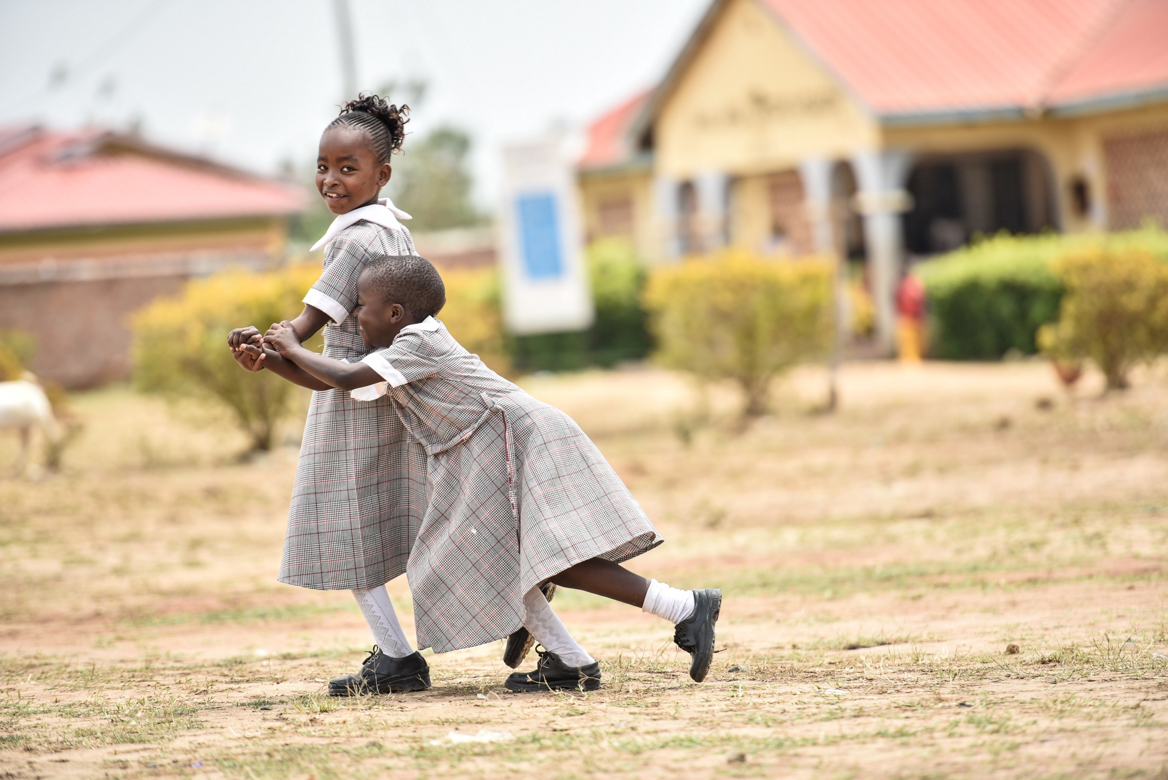 Girls playing in Malaba, a cross-border community between Uganda and Kenya
