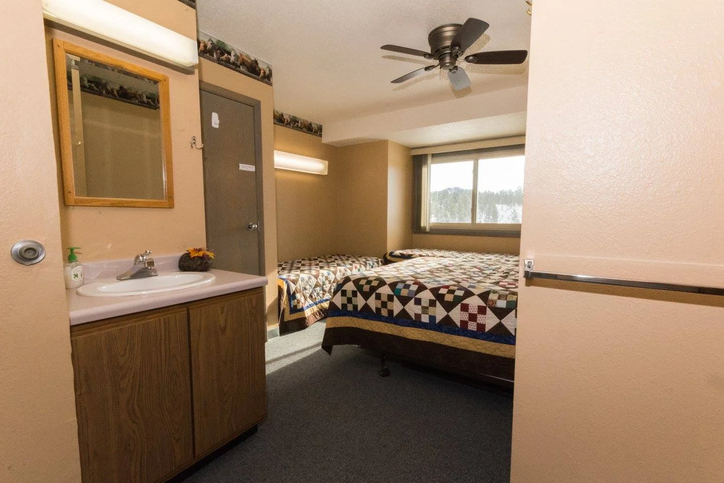 Our rooms include a sink and shared bathroom.