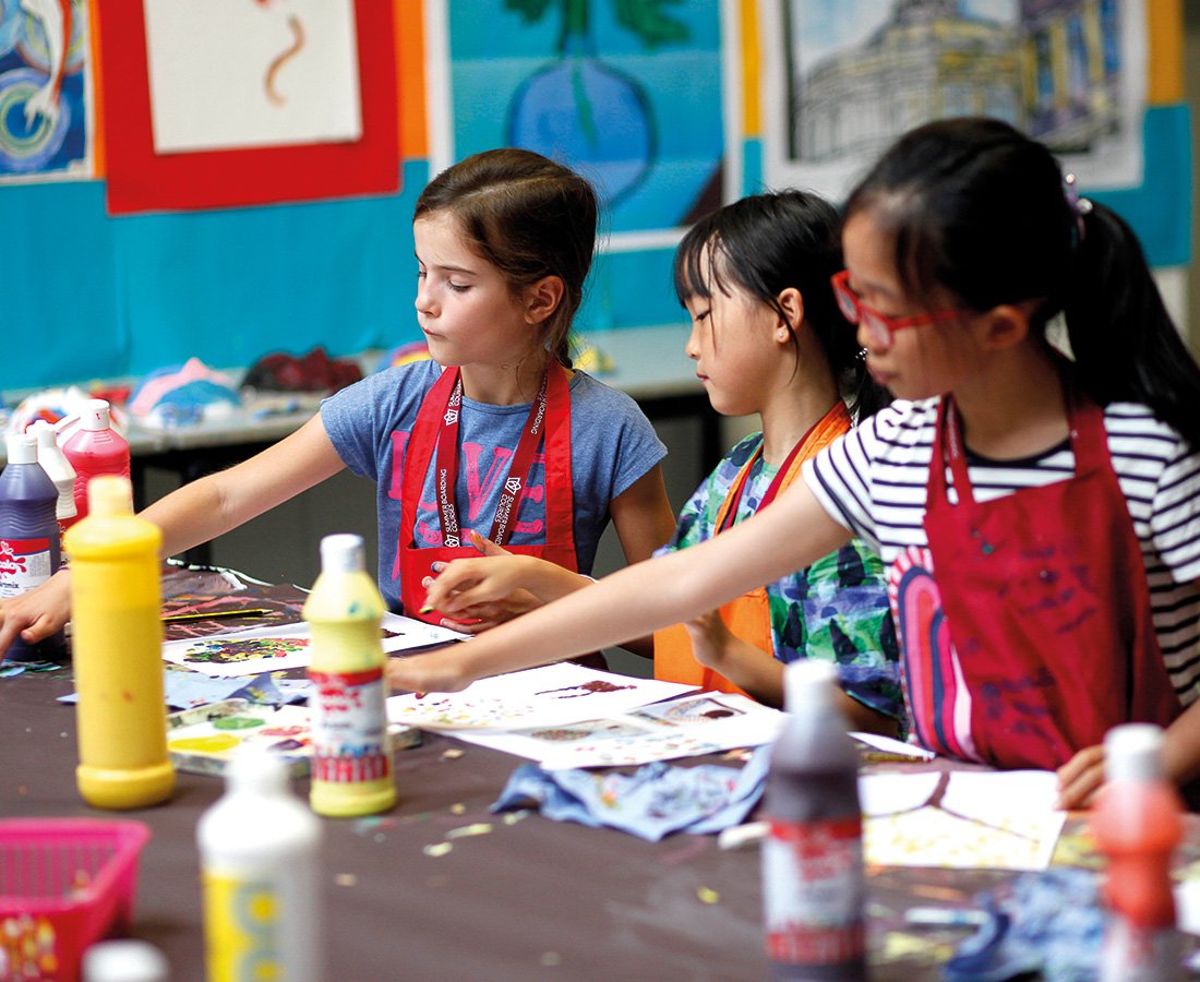 Three Female Student Doing Arts and Crafts at Camp Dragon.jpg