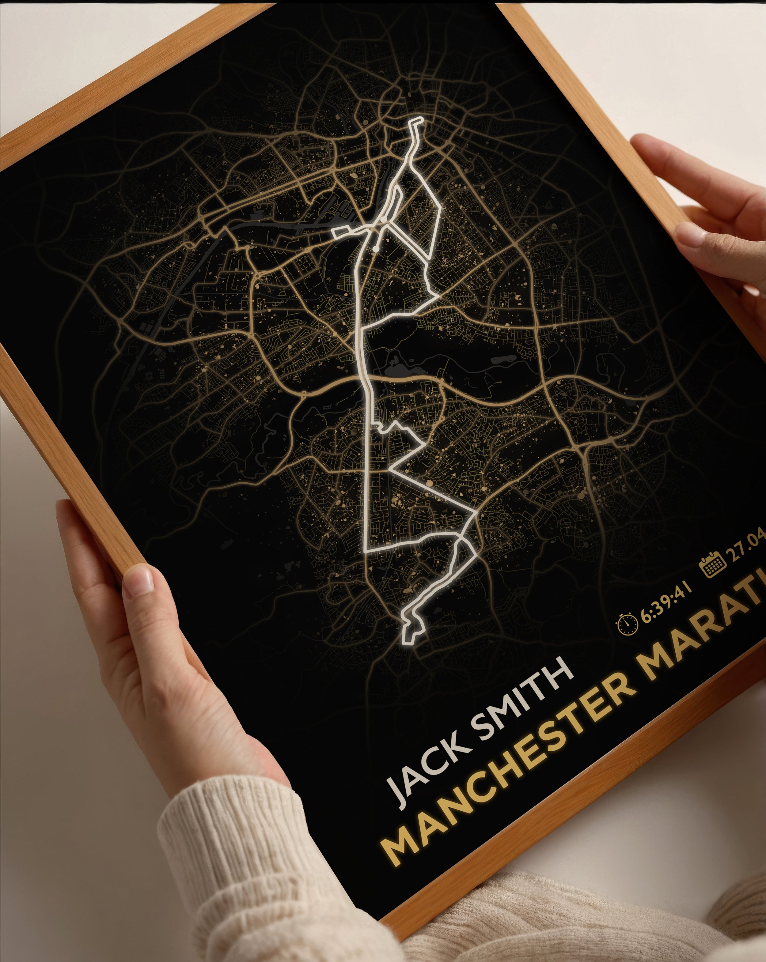 Manchester marathon holding frame.jpg