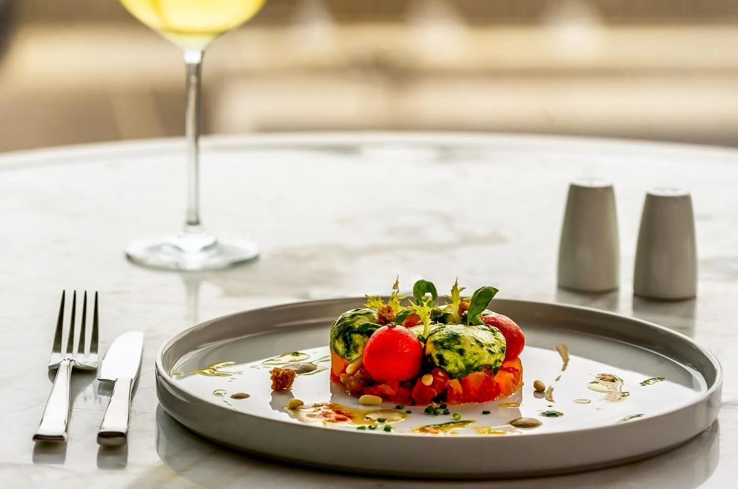 Caprese 2.0 | 
Compressed Heirloom tomato, rehydrated pine nuts, basil and Castelvetrano Olive emulsion, bocconcino, mozzarella sphere, San Marzano Tomato seeds, Breadcrumbs 
Chef @sierra4407 
Lens - 70-200mm 
Aperture - F/6.1
Shutter - 1/200sec
ISO 