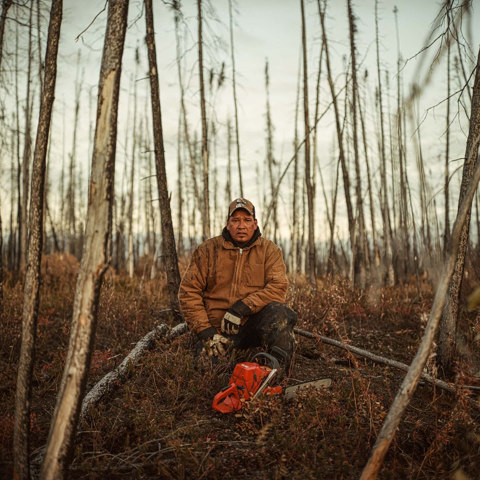 Robert Spence rests while cutting firewood near his trapline on the Churchill River, where he takes his family to hunt moose each fall. Spence is an elected councillor of the Tataskweyak Cree Nation, known as the community of Split Lake. At one time…