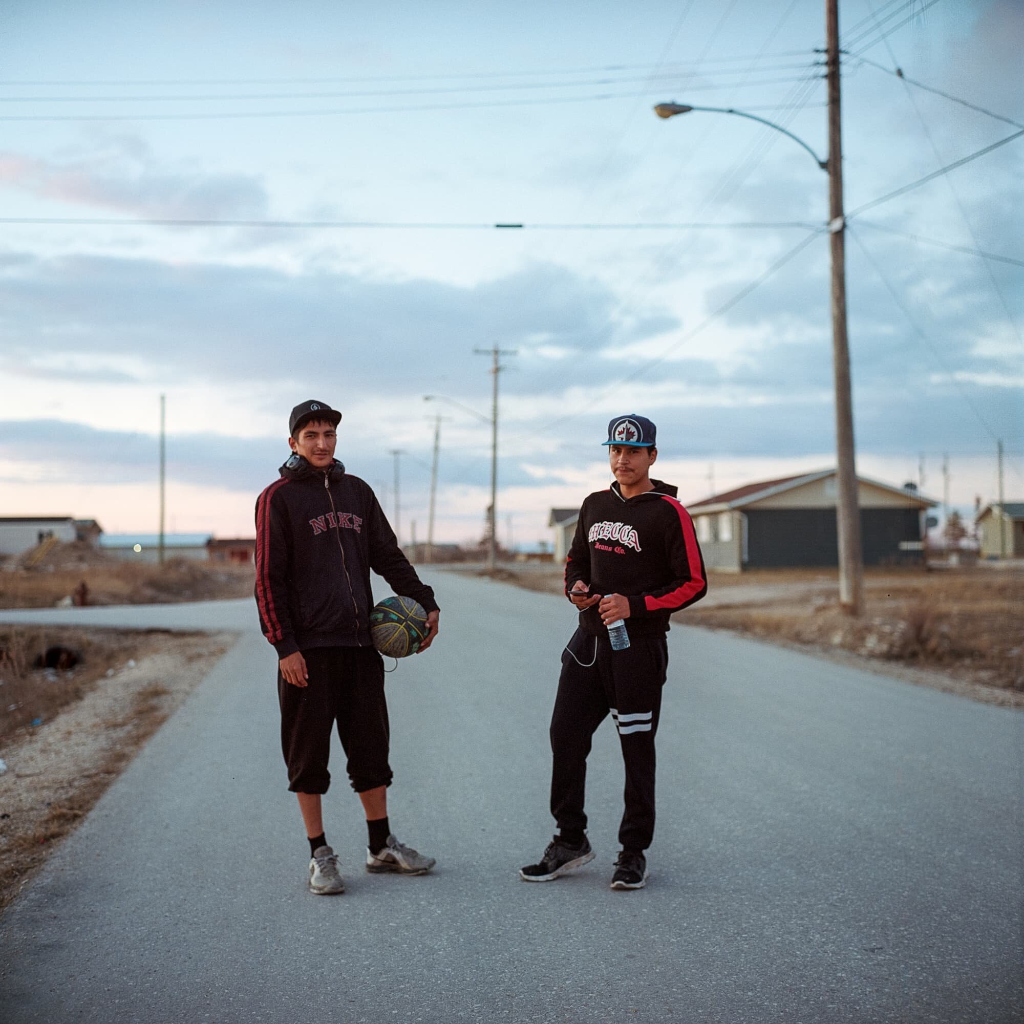 Jared Morde and Jared Lachose stand for a portrait on the streets of Easterville, Man. Easterville, the reserve community of the Chemawawin Cree Nation, was founded in 1962 after the nation was forcibly relocated from its original community closer t…
