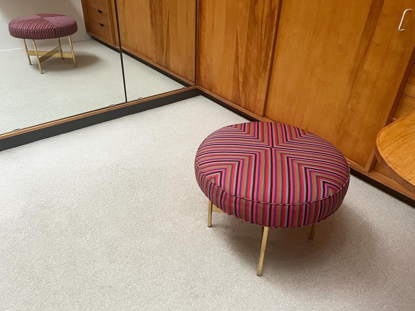 An incredible vanity stool by Alexander Girard in polished and lacquered brass with AG upholstery in Xenia Miller&rsquo;s dressing room at The Miller House in @columbusindiana w/ @blwever