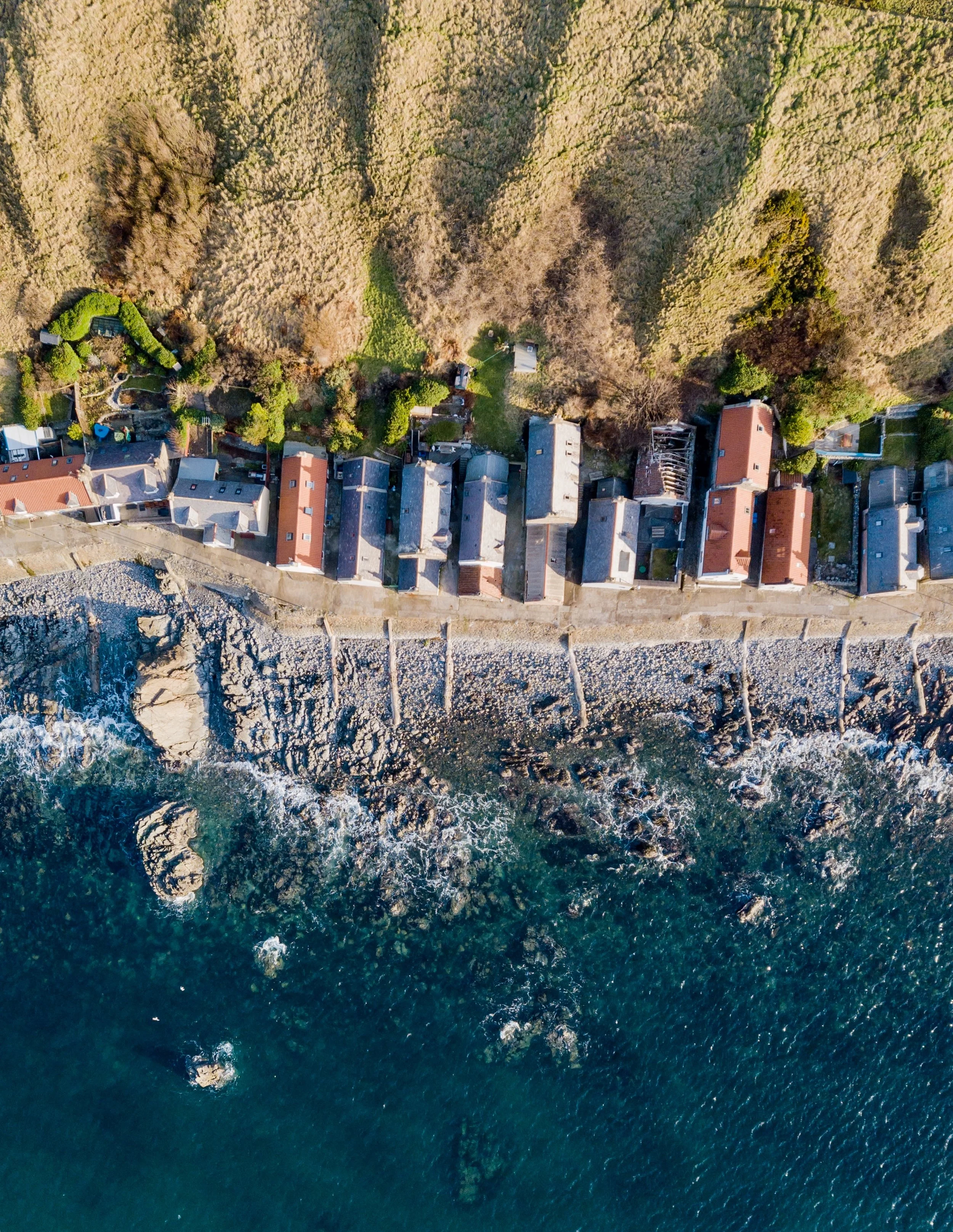 Rows of beach houses on the water. Perfect place to take a vacation after your close on your new home and sign your mortgage documents!