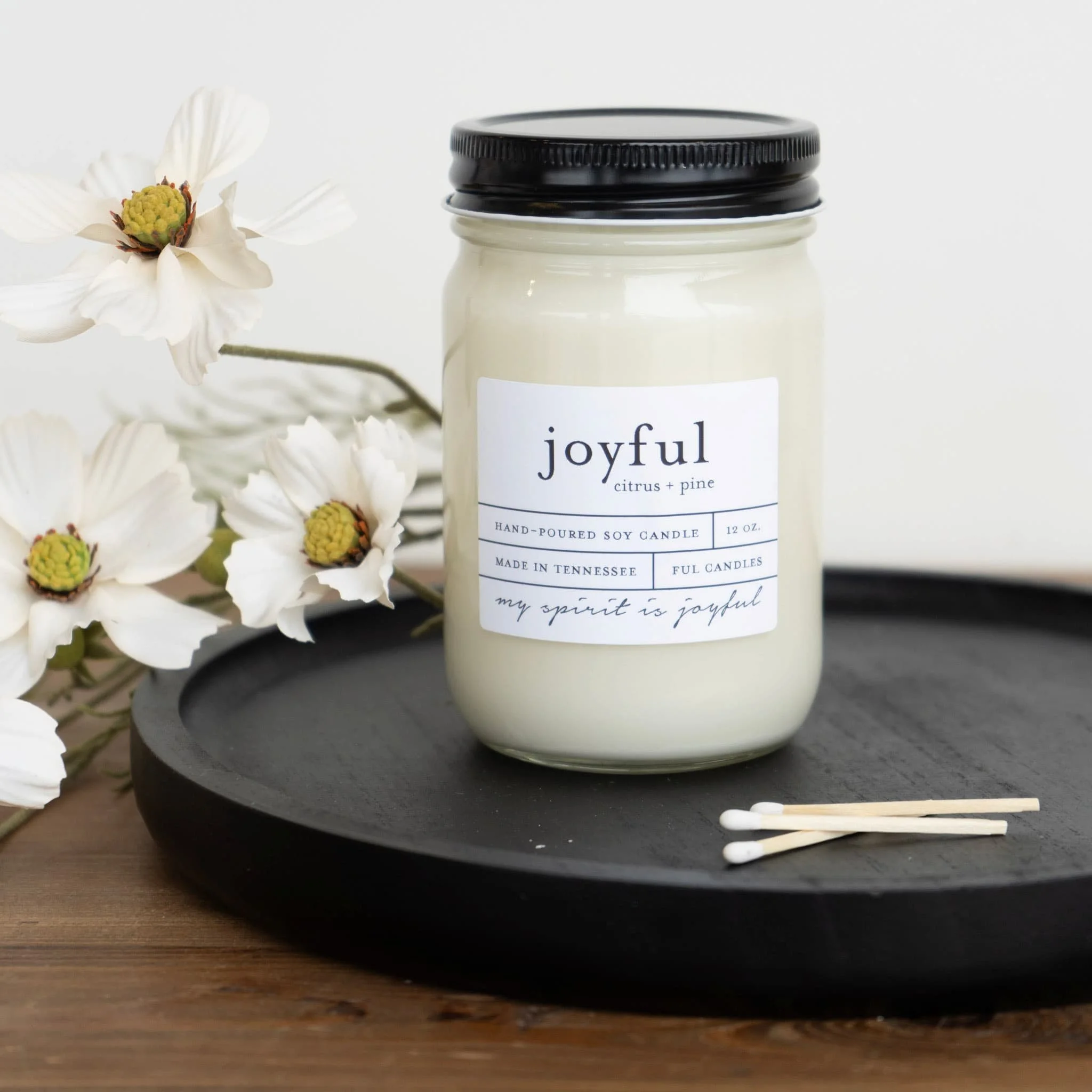Bright aesthetic product photography featuring joyful candle, styled.jpg