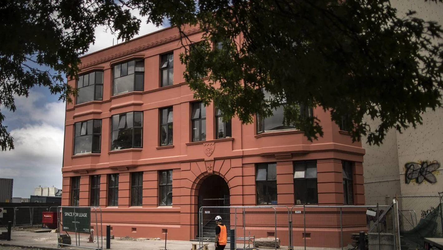 Patrons replace squatters as heritage building reopens