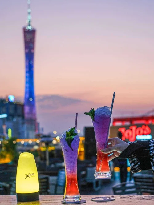 Sunset cocktails at Party Pier Guangzhou with Canton Tower in the background