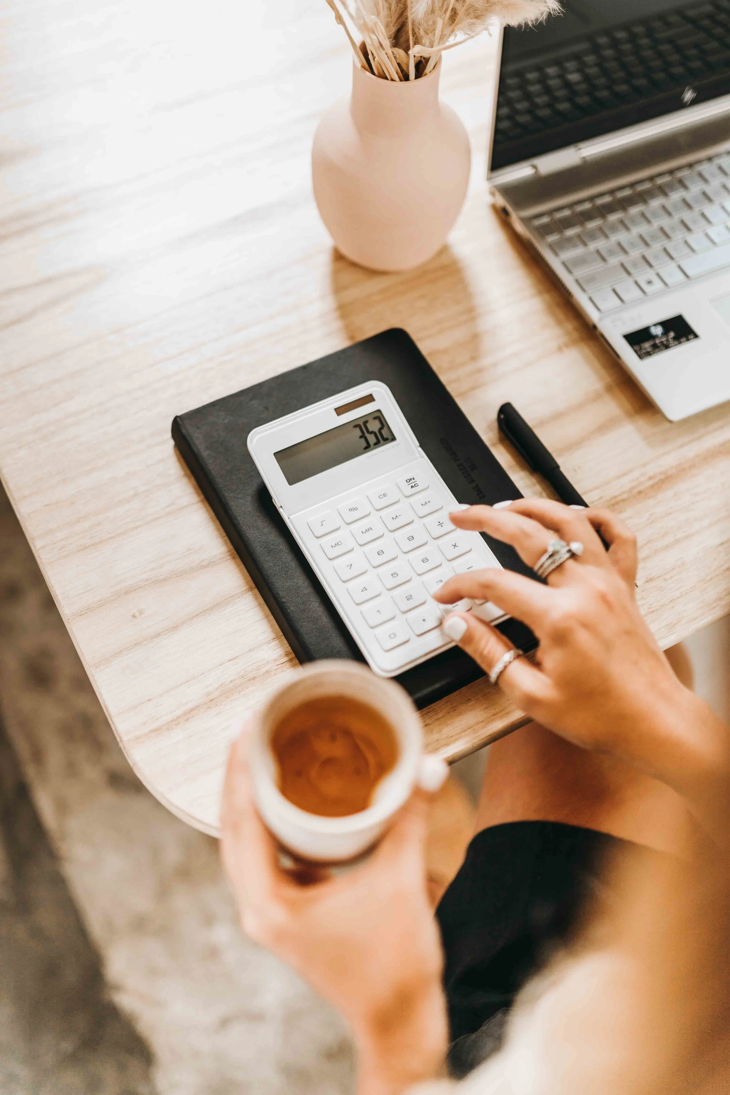 keira-mason-zest-bookkeeping-solutions-adding-numbers-on-calculator.jpg