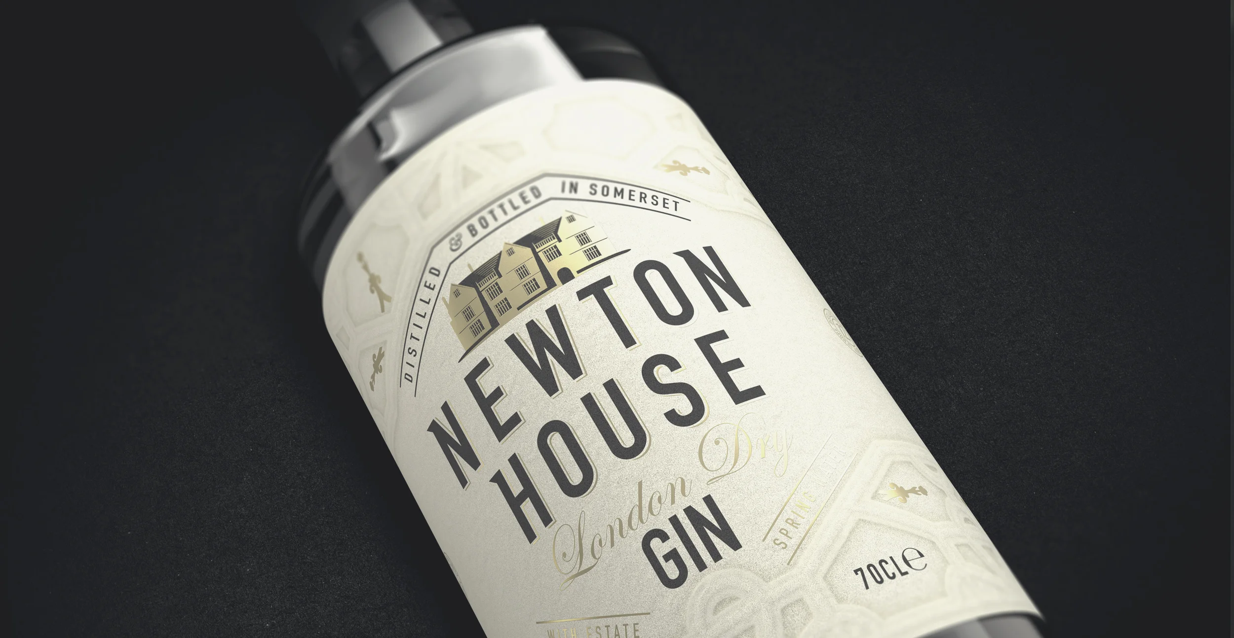 Newton House Gin Branding and Packaging Design bottle lying down